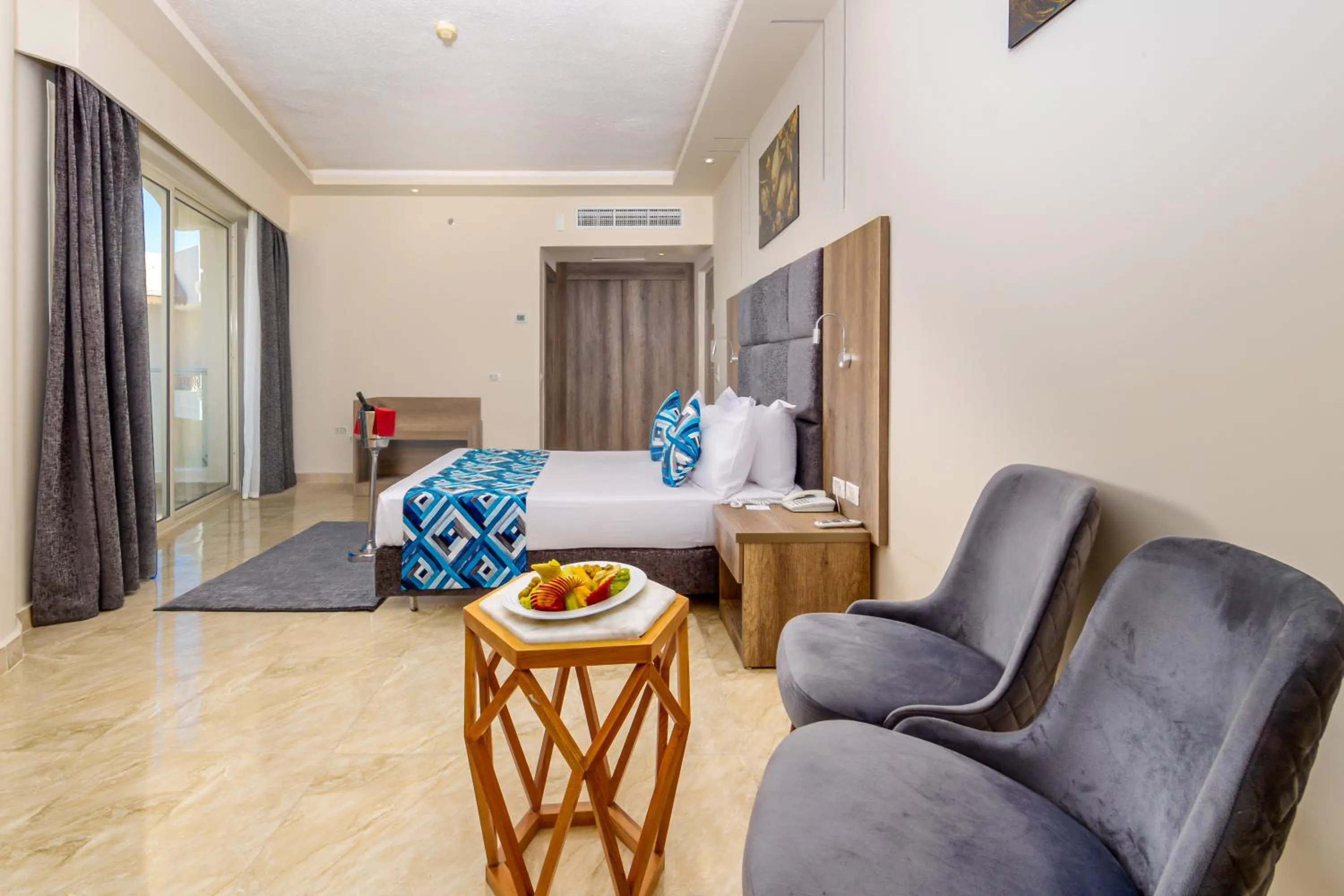 Seating area, Bed in Seagull Beach Resort - Families and Couples Only