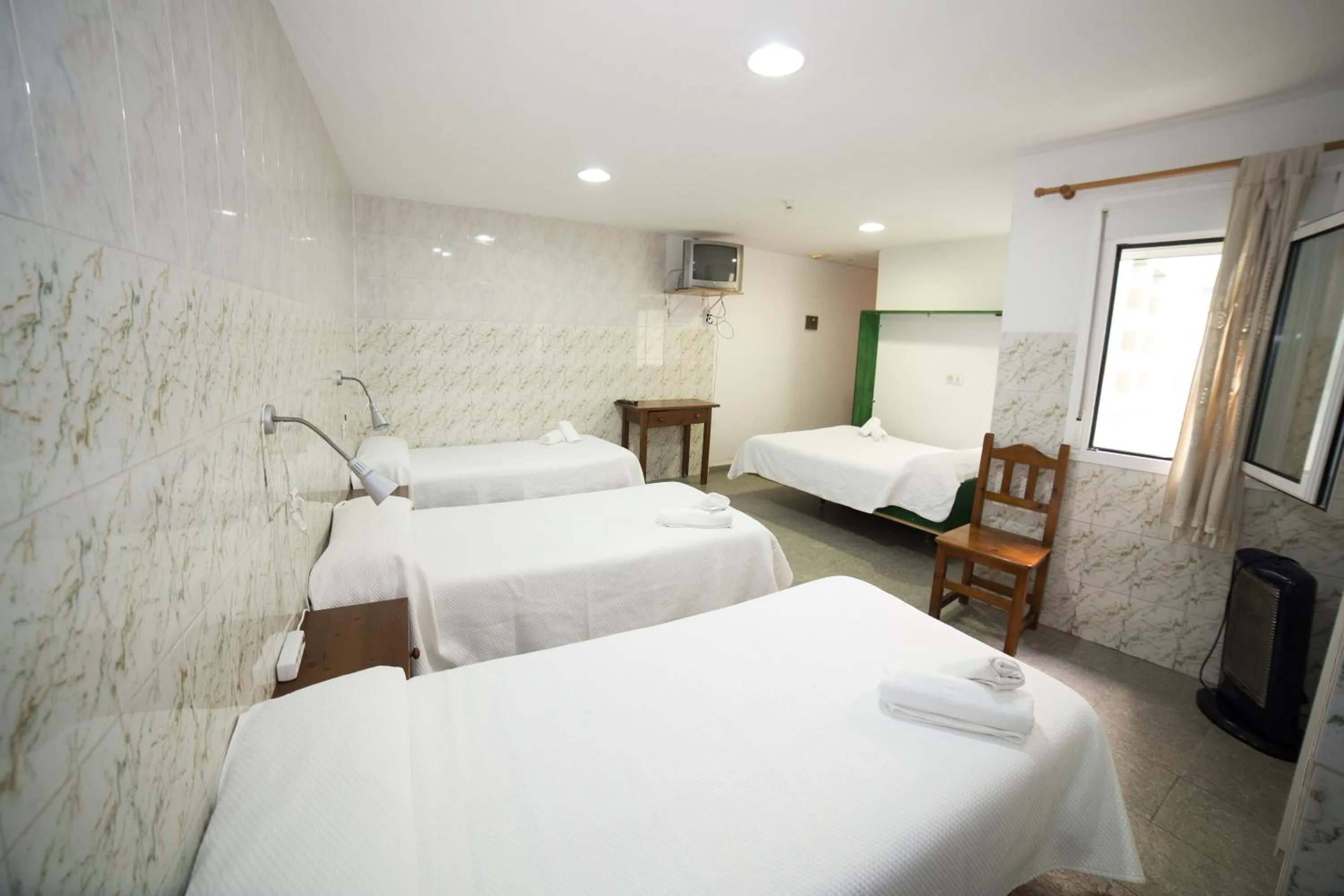 Photo of the whole room, Bed in Hospedaje Lisboa Algeciras P Ca 0214 y A Ca 0232