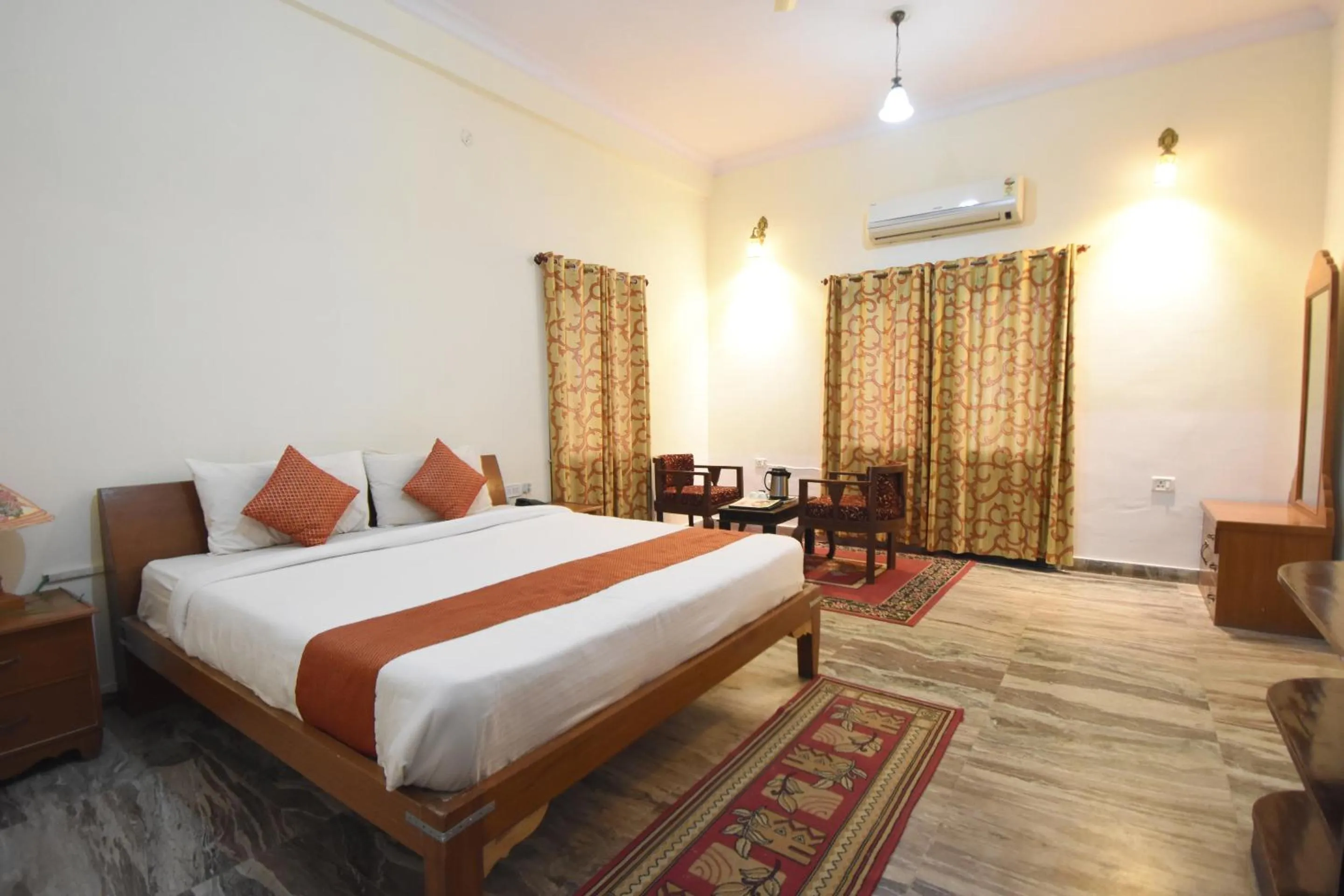 Bedroom in Satyam Palace Resort