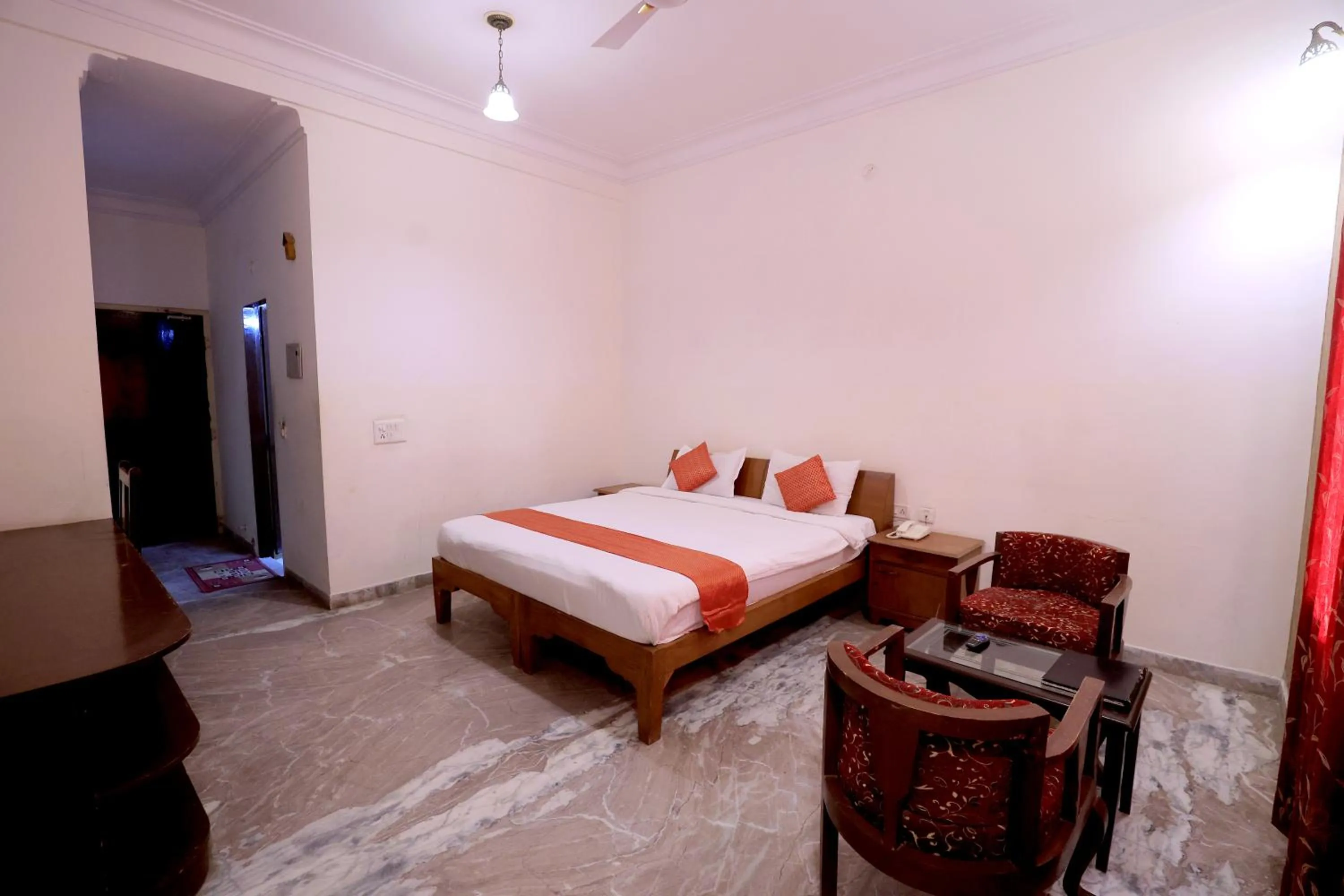 Bed in Satyam Palace Resort