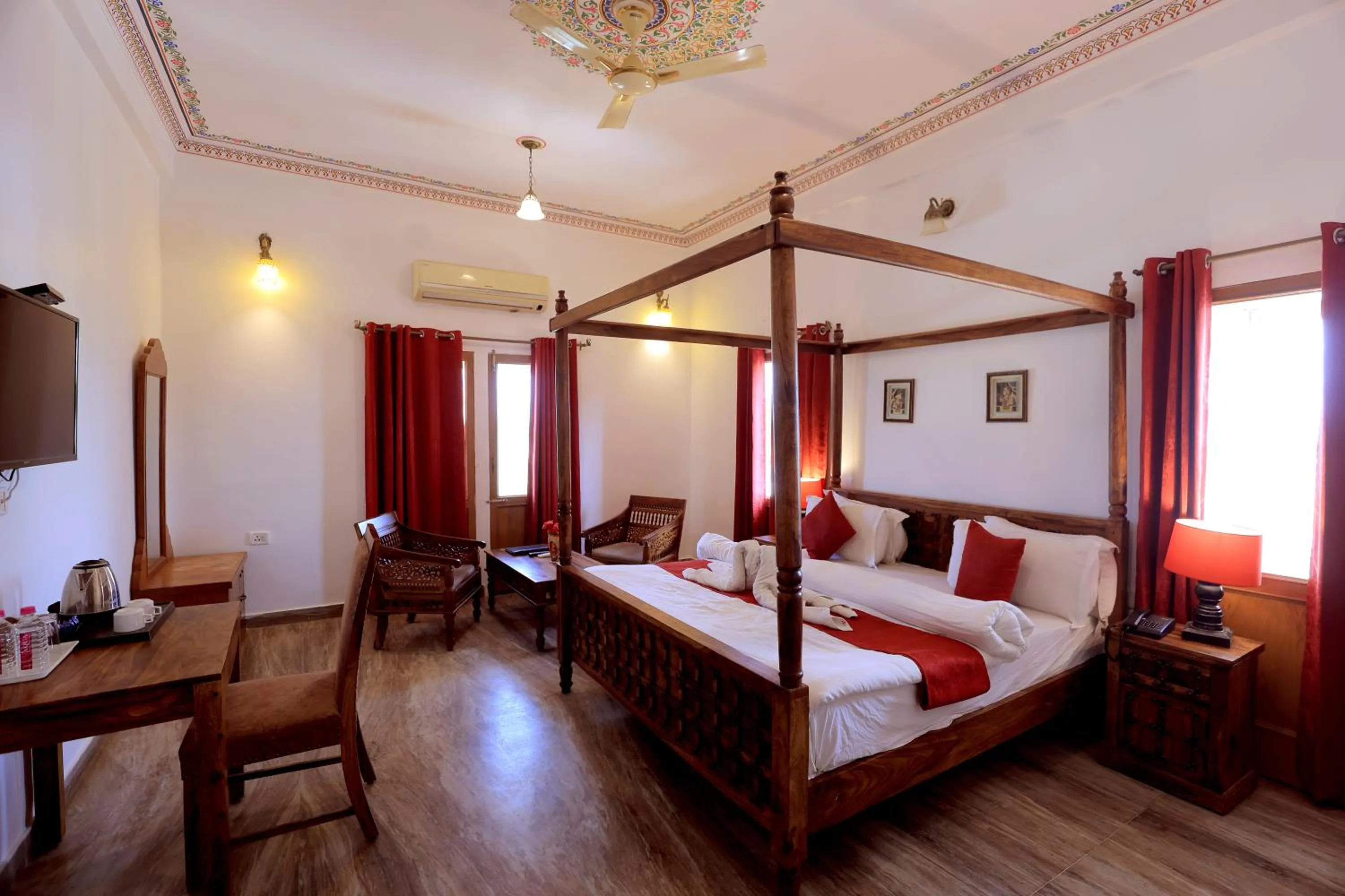Bedroom in Satyam Palace Resort