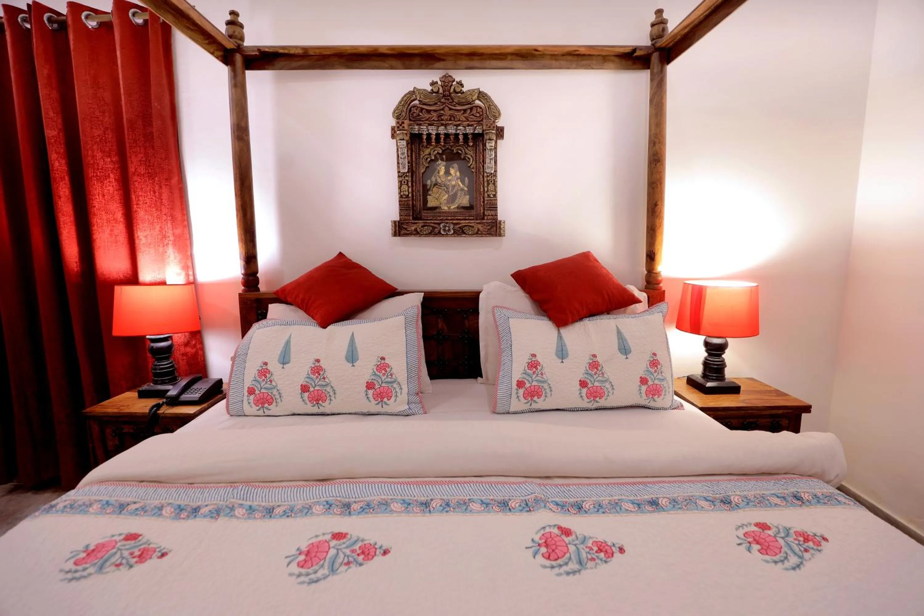 Bed in Satyam Palace Resort