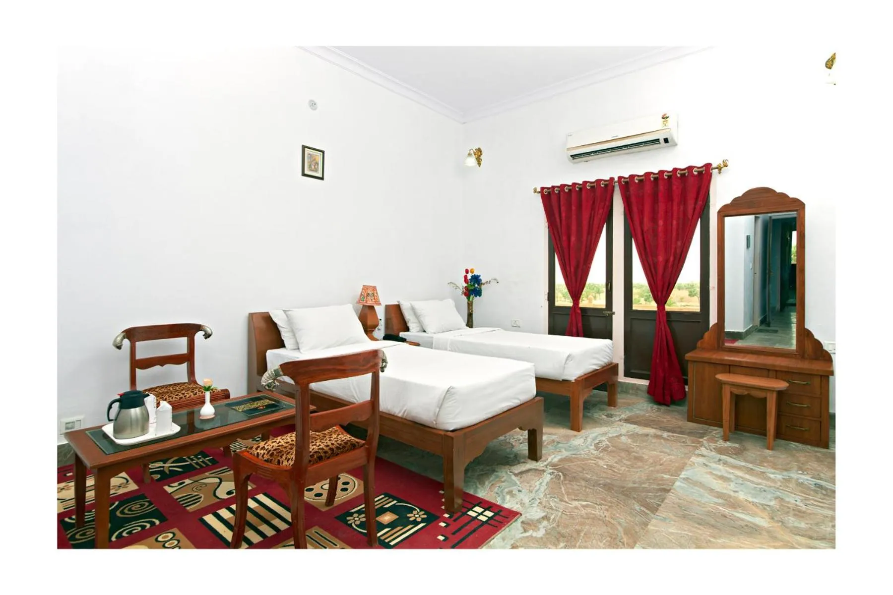 Bed in Satyam Palace Resort