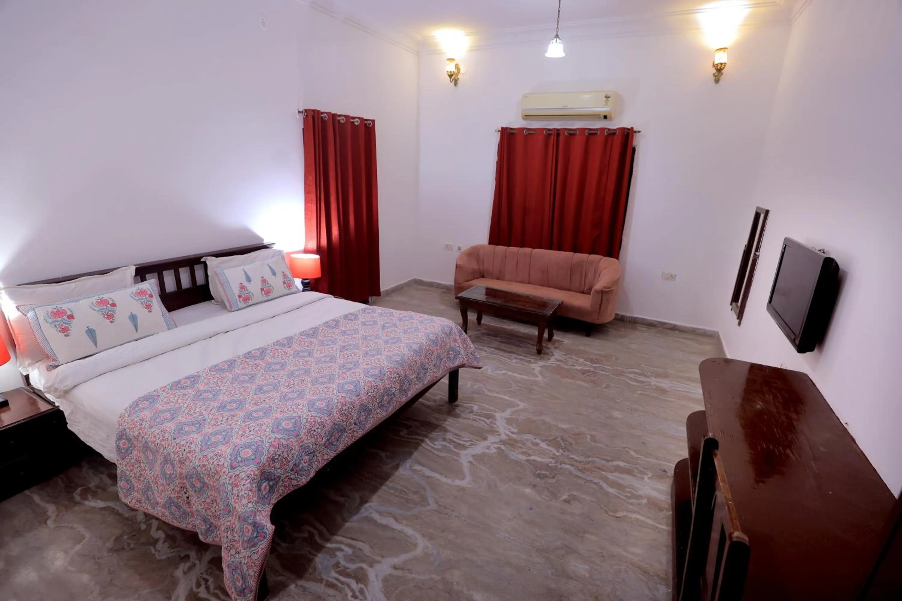 Bedroom in Satyam Palace Resort