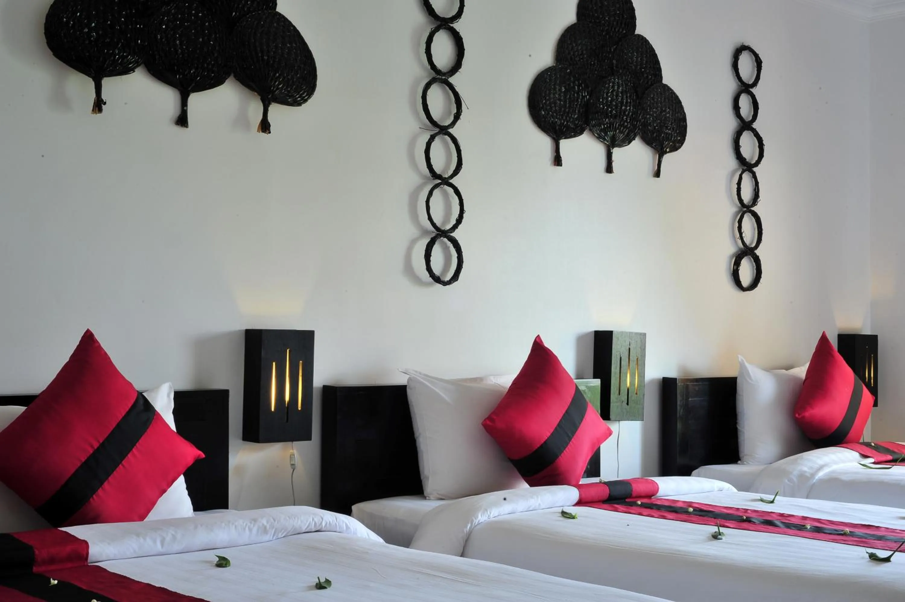 Bed in La Niche D'angkor Boutique Hotel