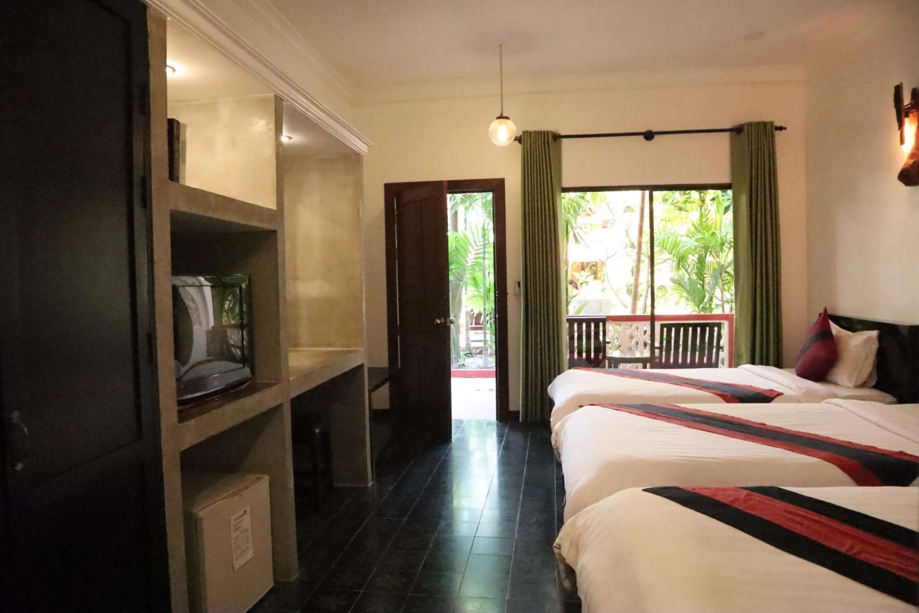 Photo of the whole room, Bed in La Niche D'angkor Boutique Hotel