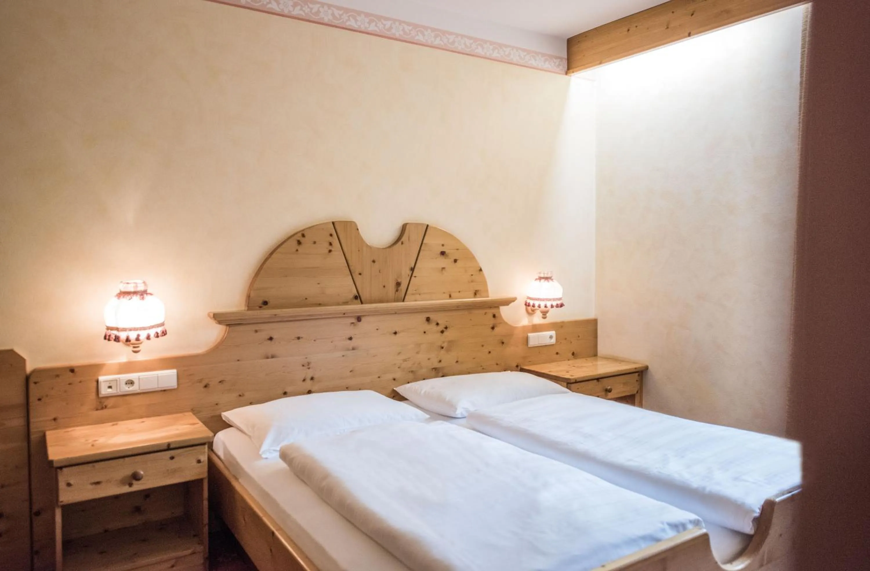 Bed in Hotel Edelweiss