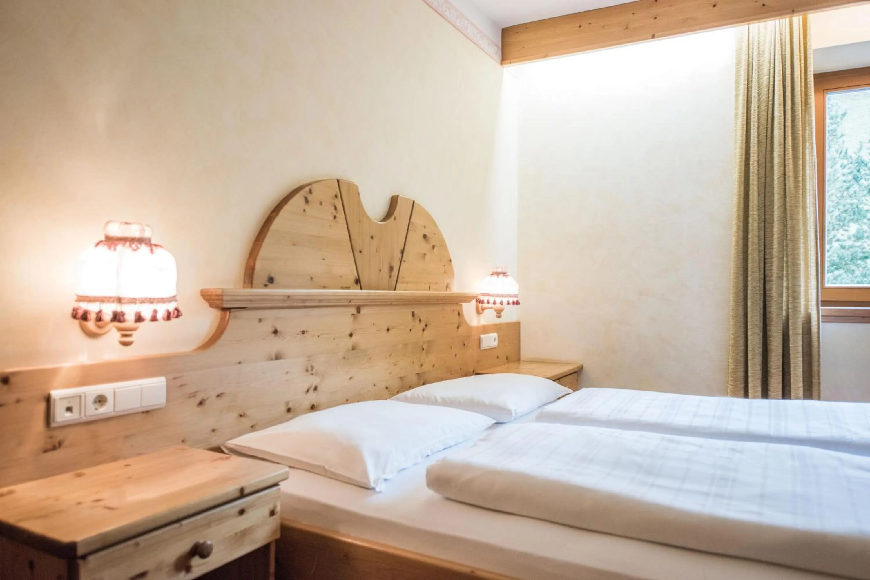 Bed in Hotel Edelweiss