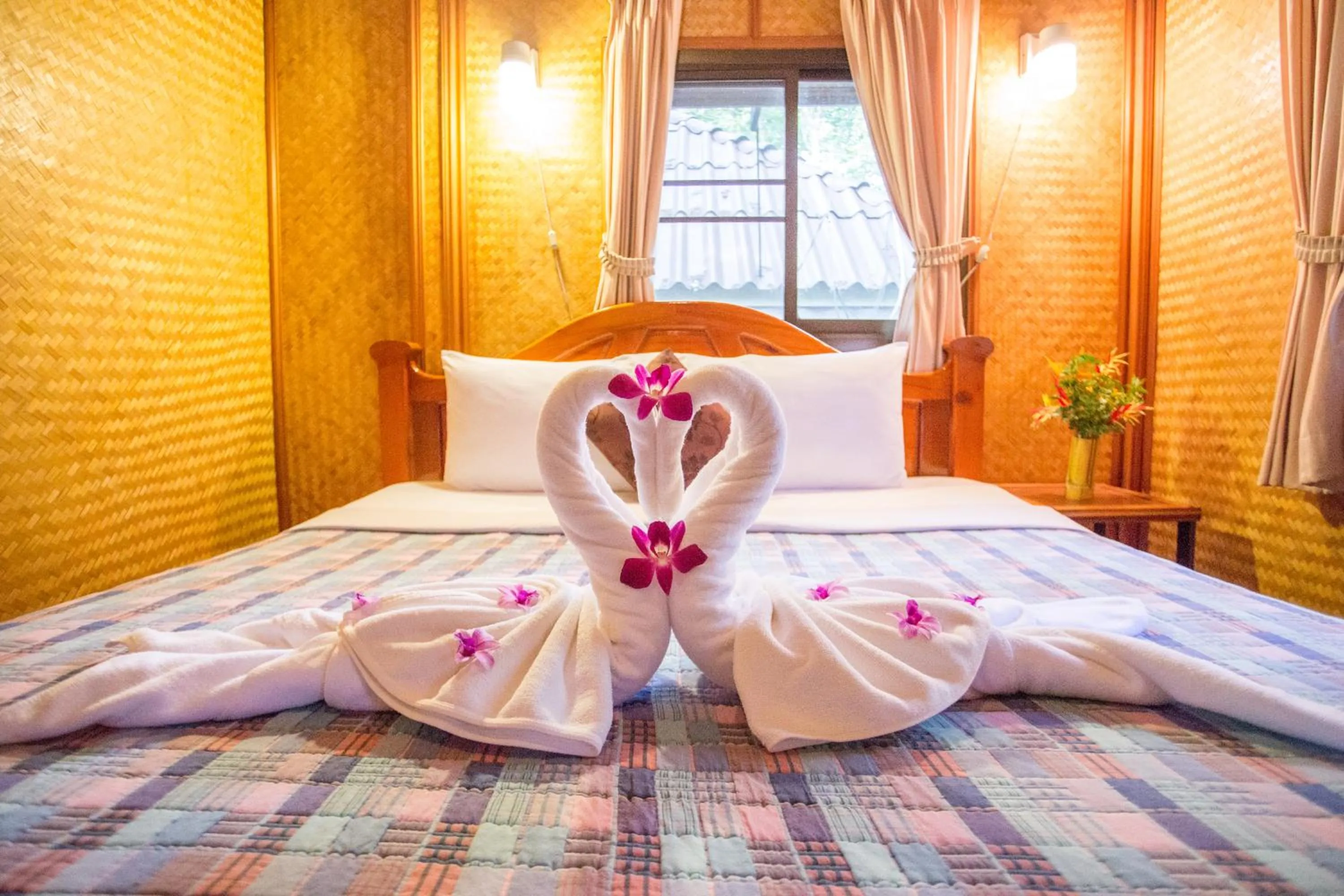 Bed in Faasai Resort & Spa