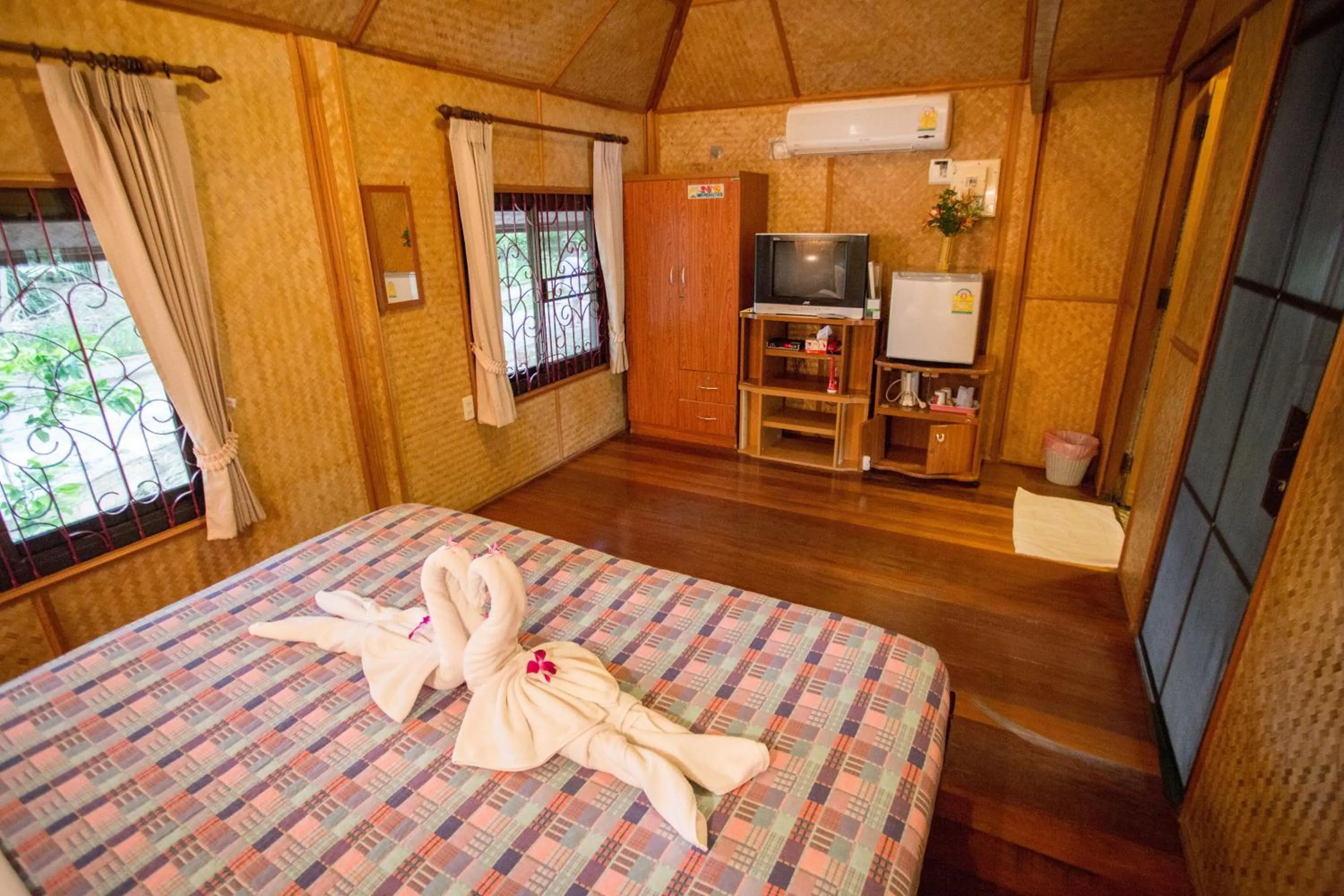 Bed in Faasai Resort & Spa