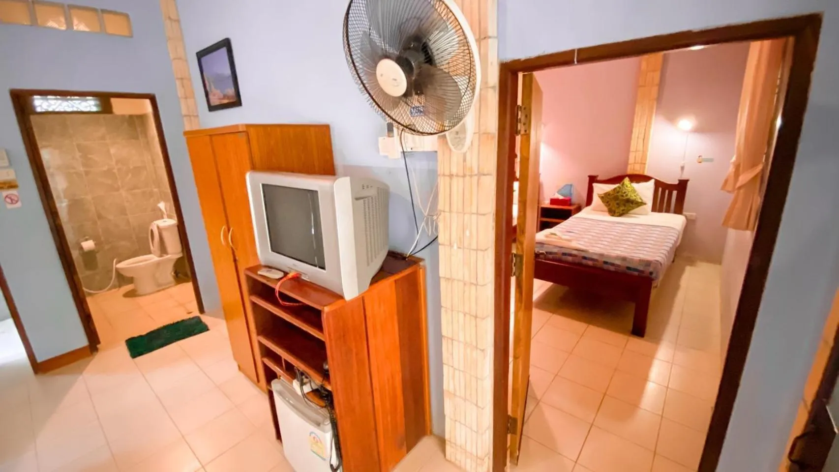 Bed in Faasai Resort & Spa