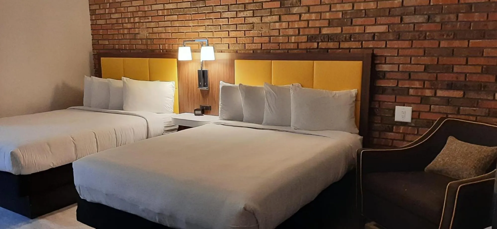 Bedroom, Bed in Penn Lodge Hotel & Suites Philadelphia - Bensalem