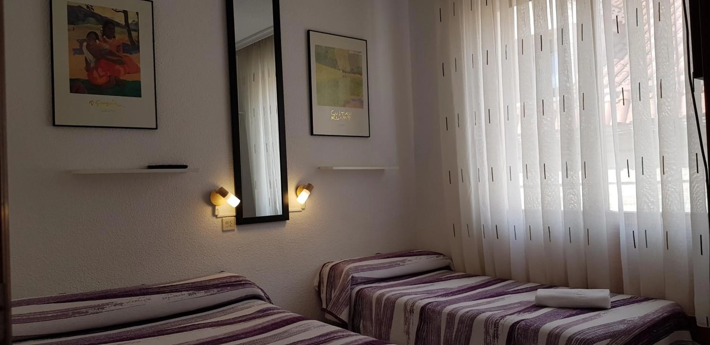Bed in Pension Salamanca