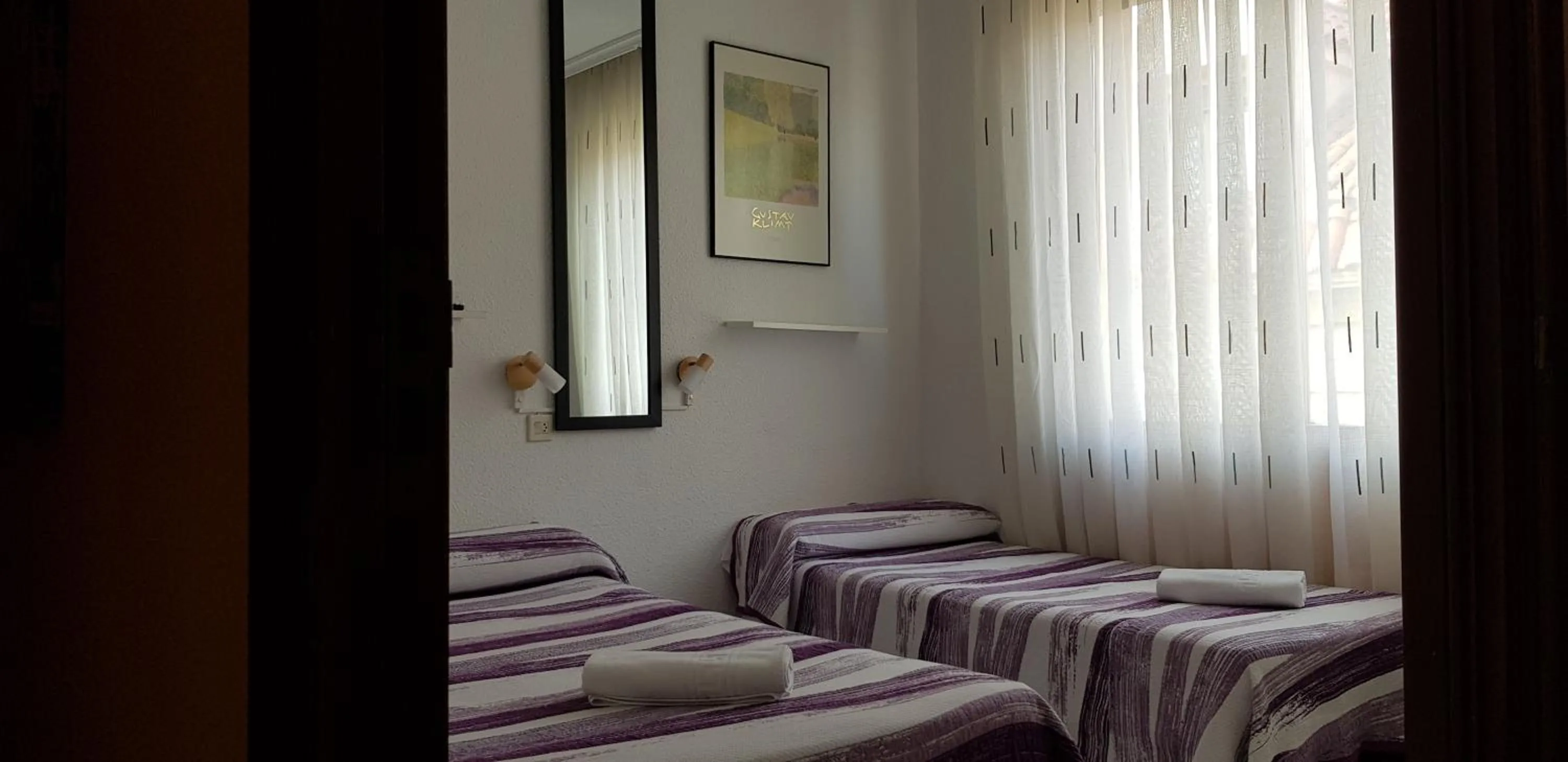 Bed in Pension Salamanca