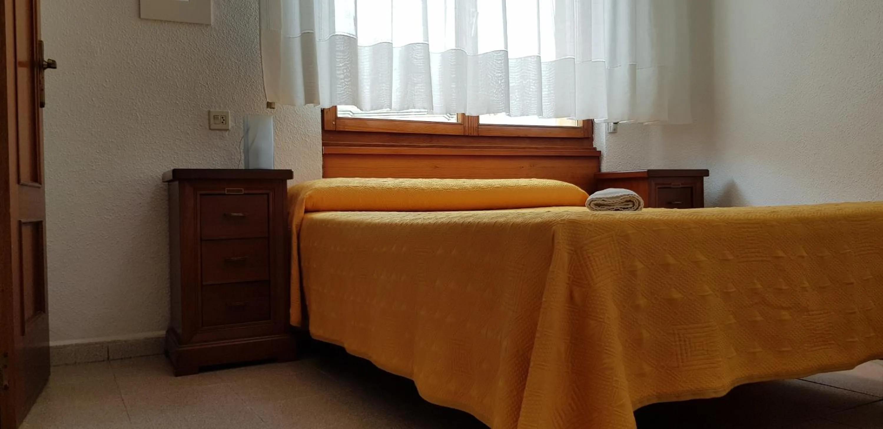 Bed in Pension Salamanca