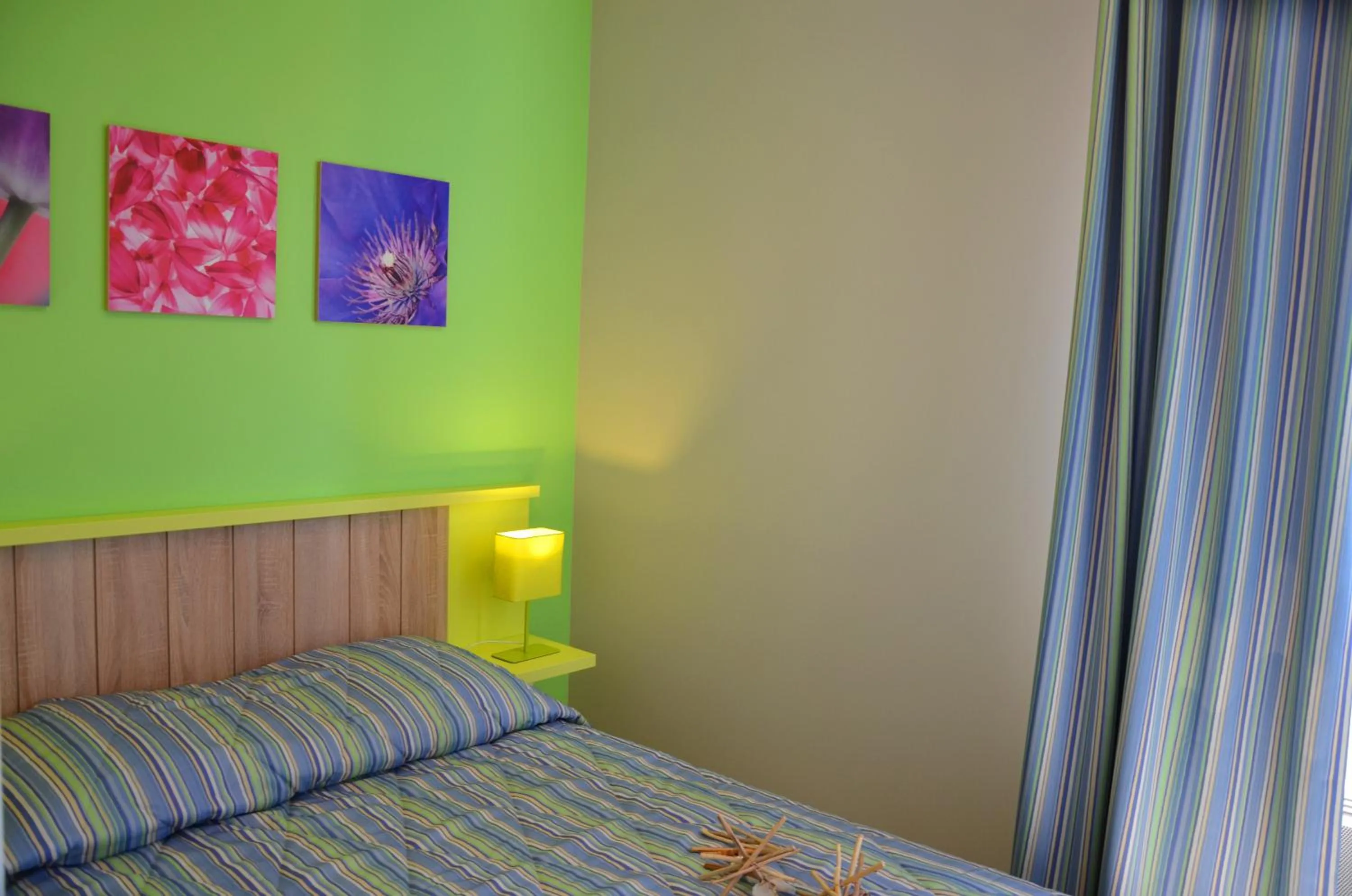 Bedroom, Bed in Lagrange Grand Bleu Vacances – Résidence La Grenadine