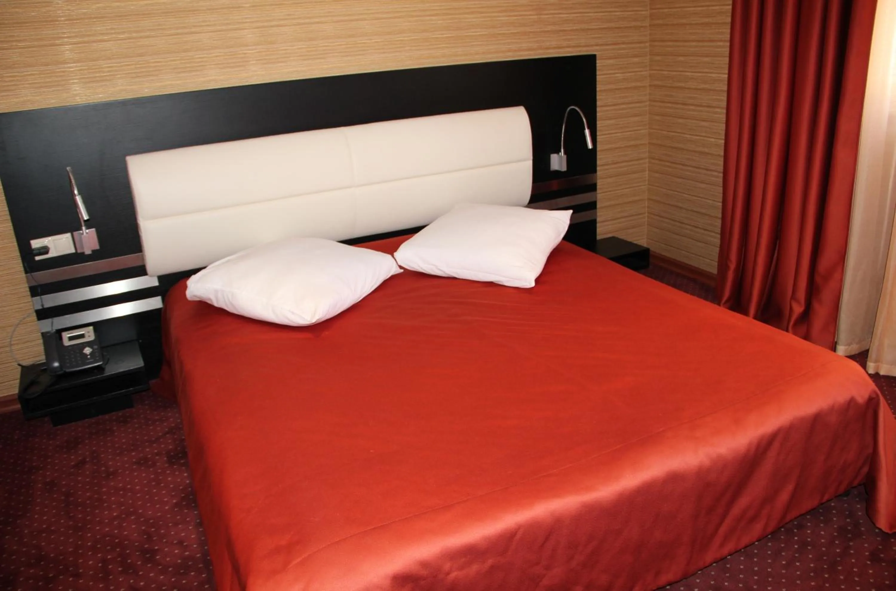 Bed in Hotel Villa Palace