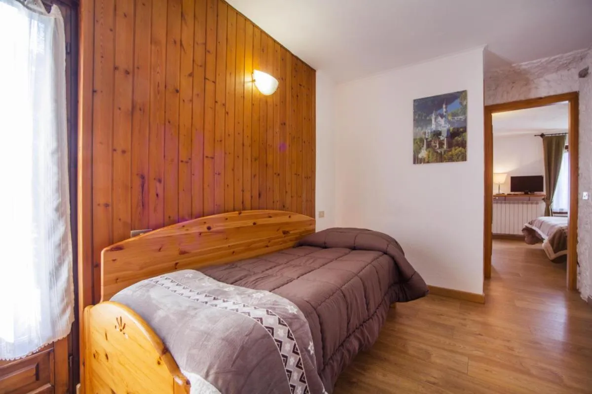 Bed in Hotel Chalet Joli