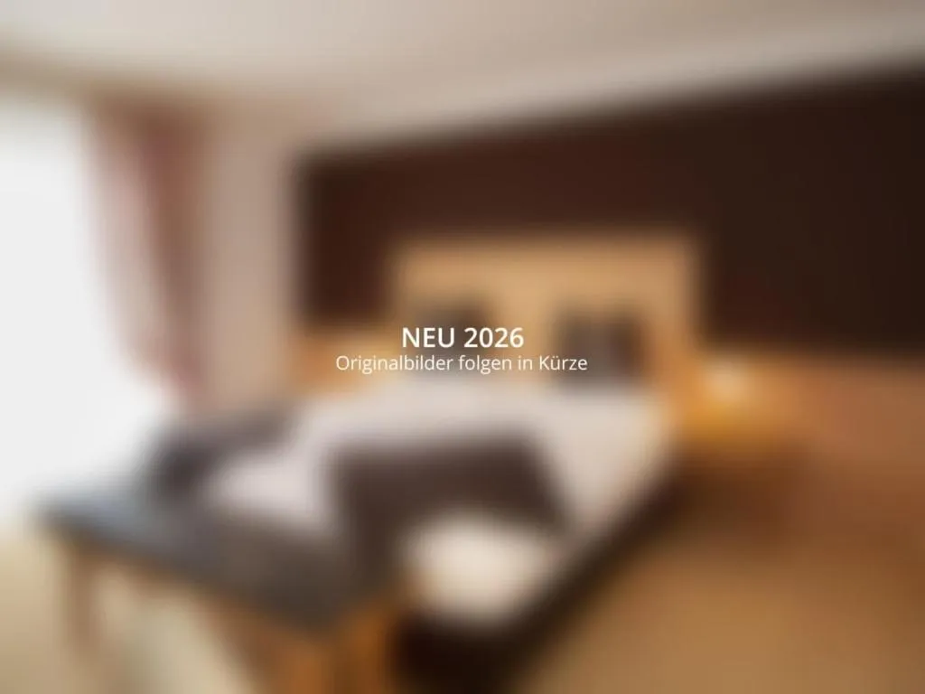 Photo of the whole room, Bed in Hotel Krimmlerfälle