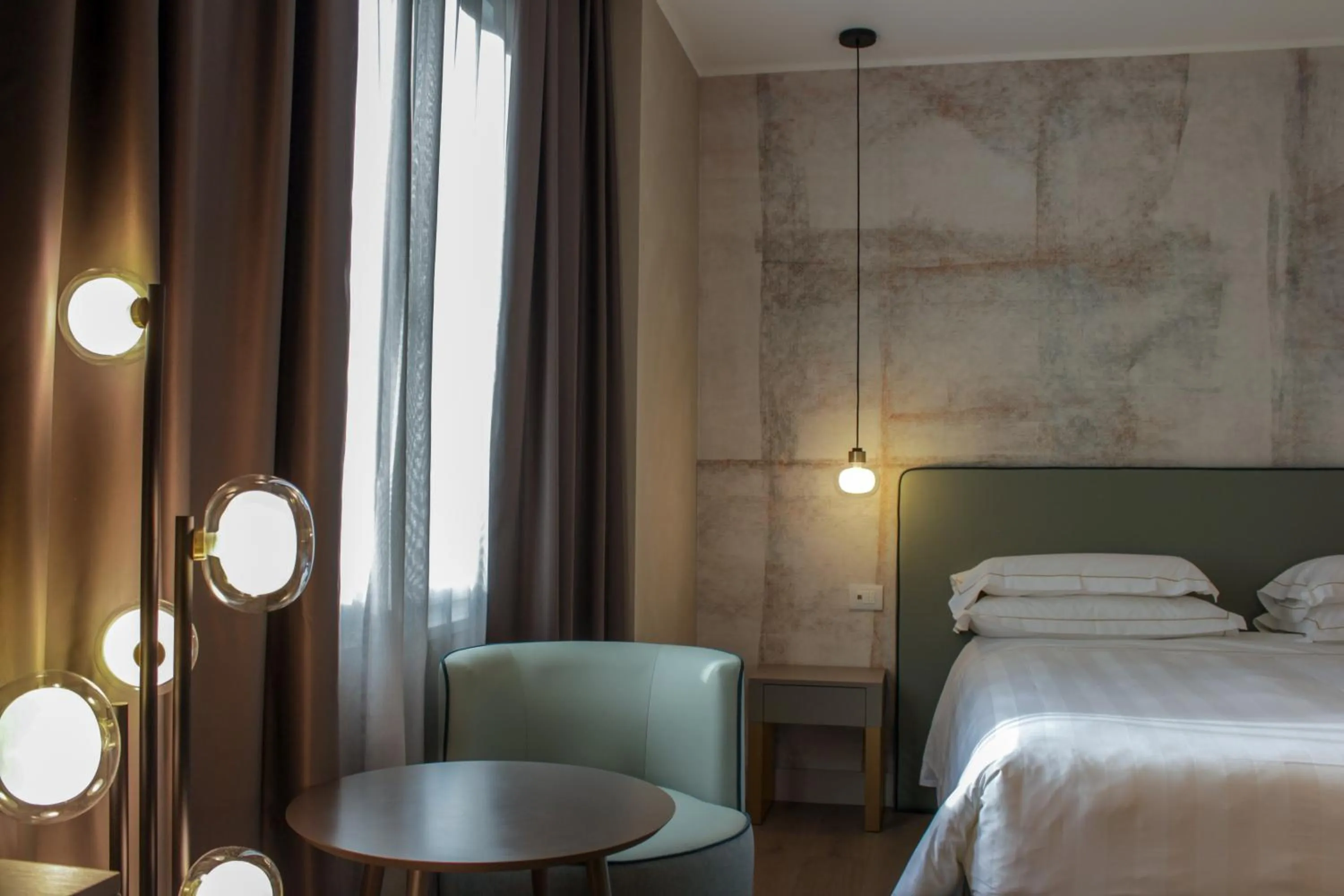 Bed in Diana Grand Hotel