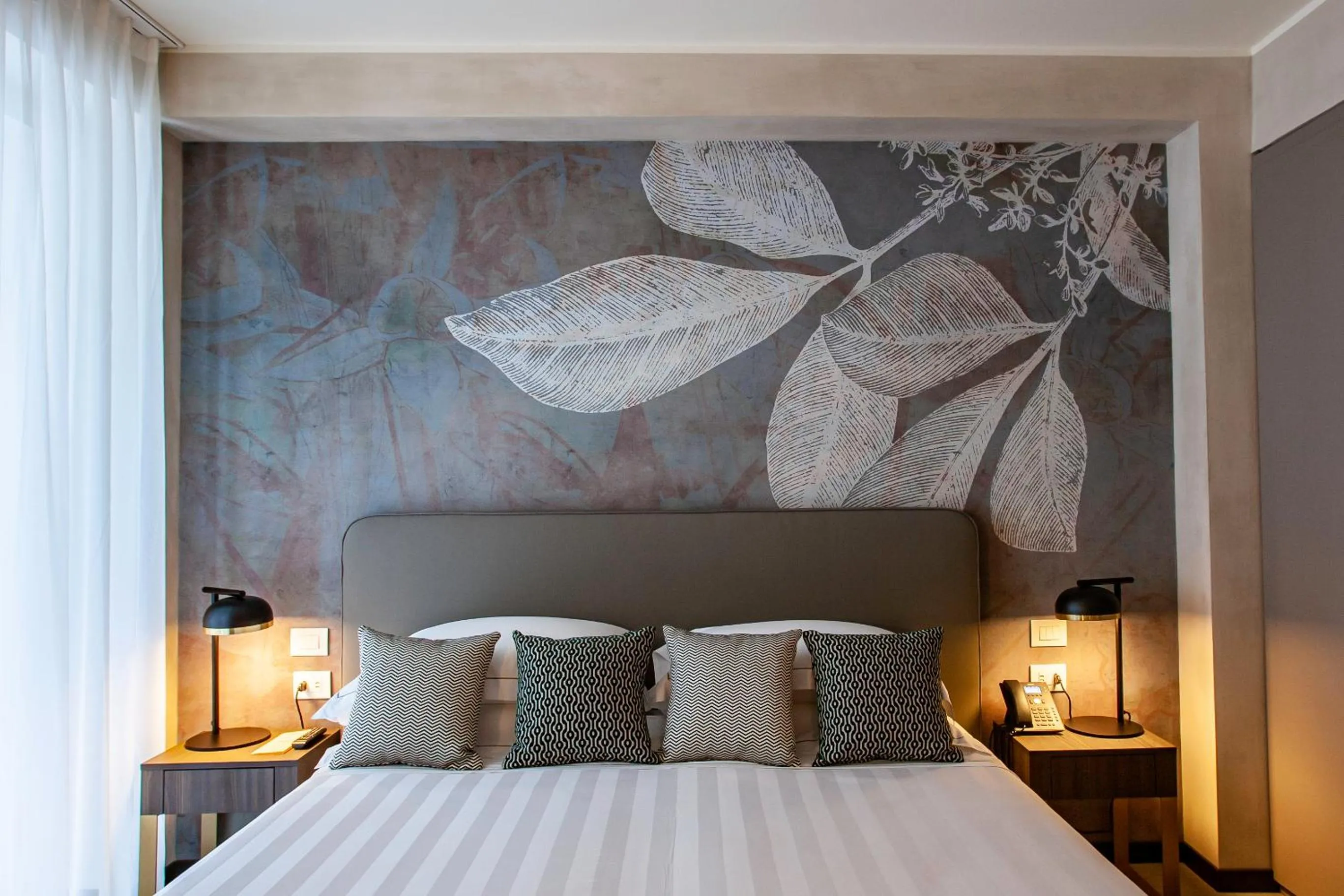 Bed in Diana Grand Hotel