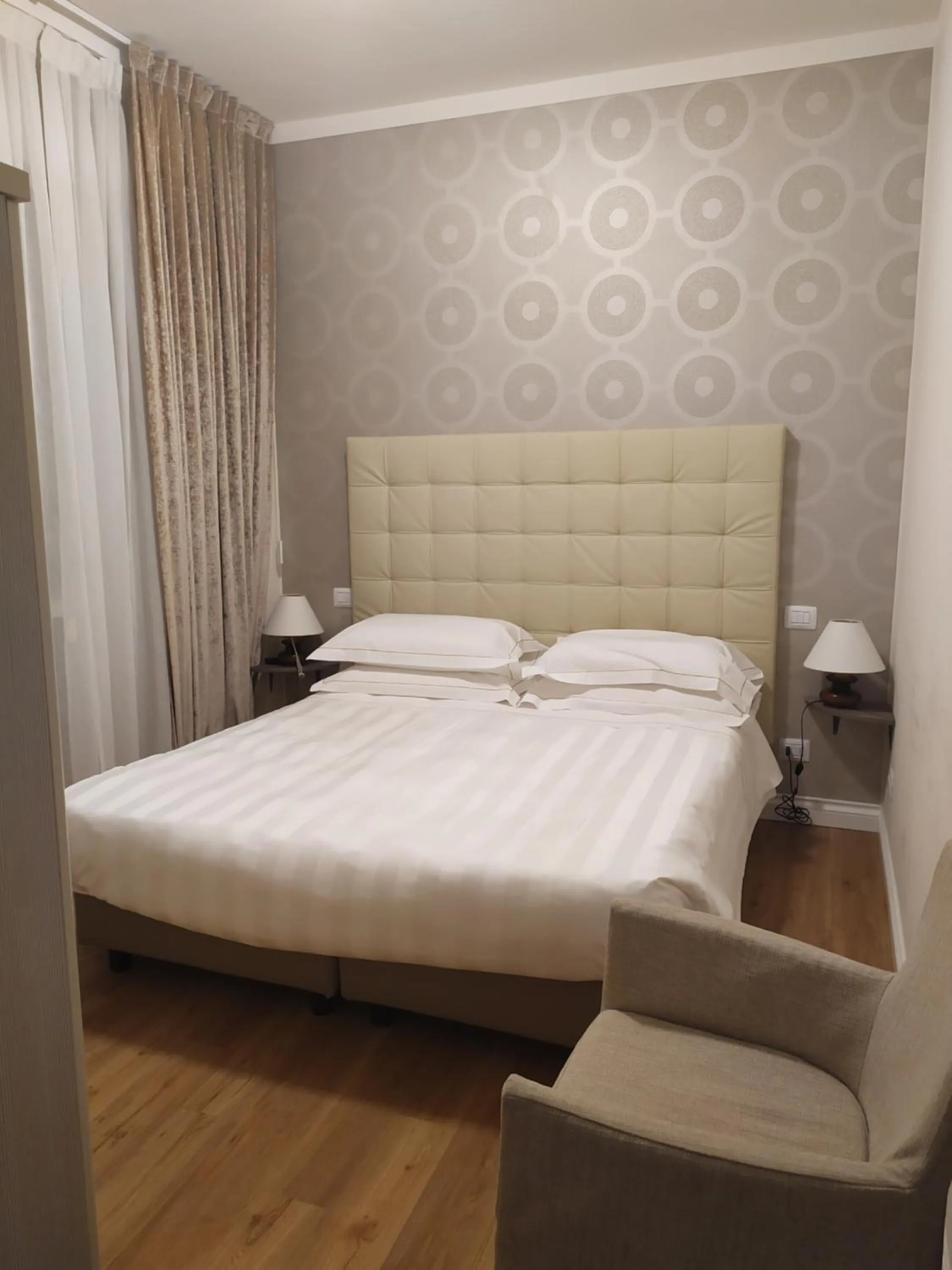 Bed in Diana Grand Hotel