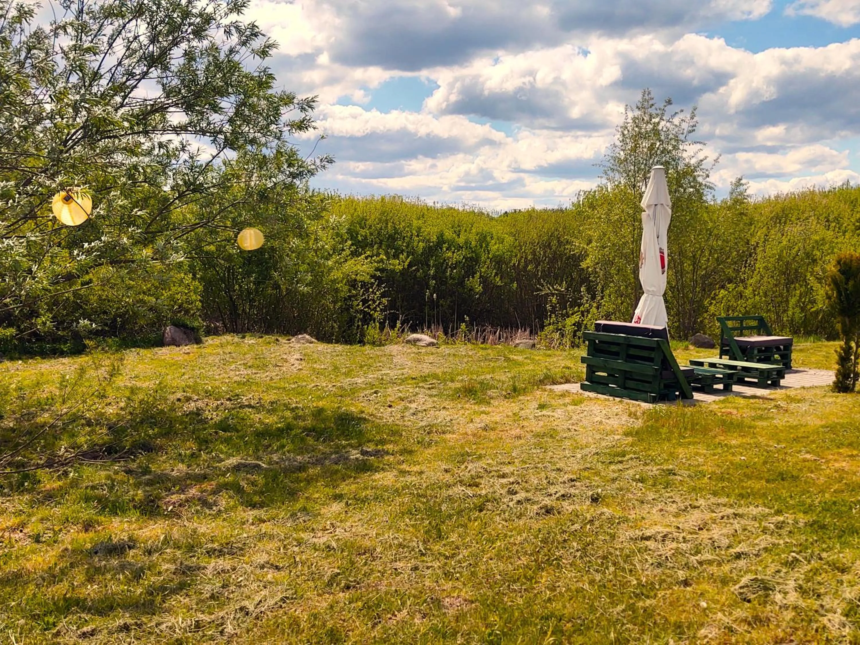 Garden in Mazurska Chata jezioro i aquapark 6 min, centrum i promenada 12 min