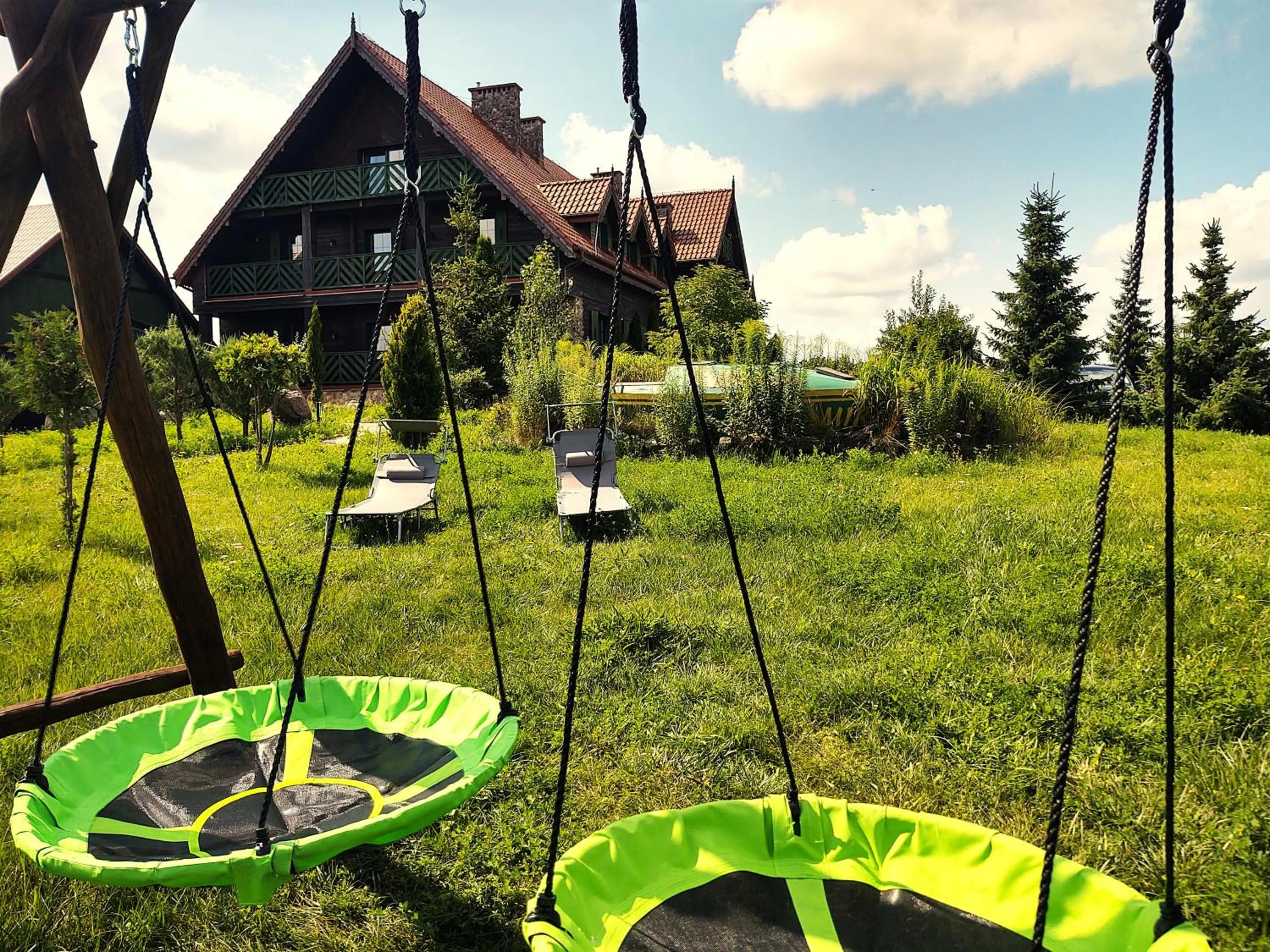 Garden in Mazurska Chata jezioro i aquapark 6 min, centrum i promenada 12 min