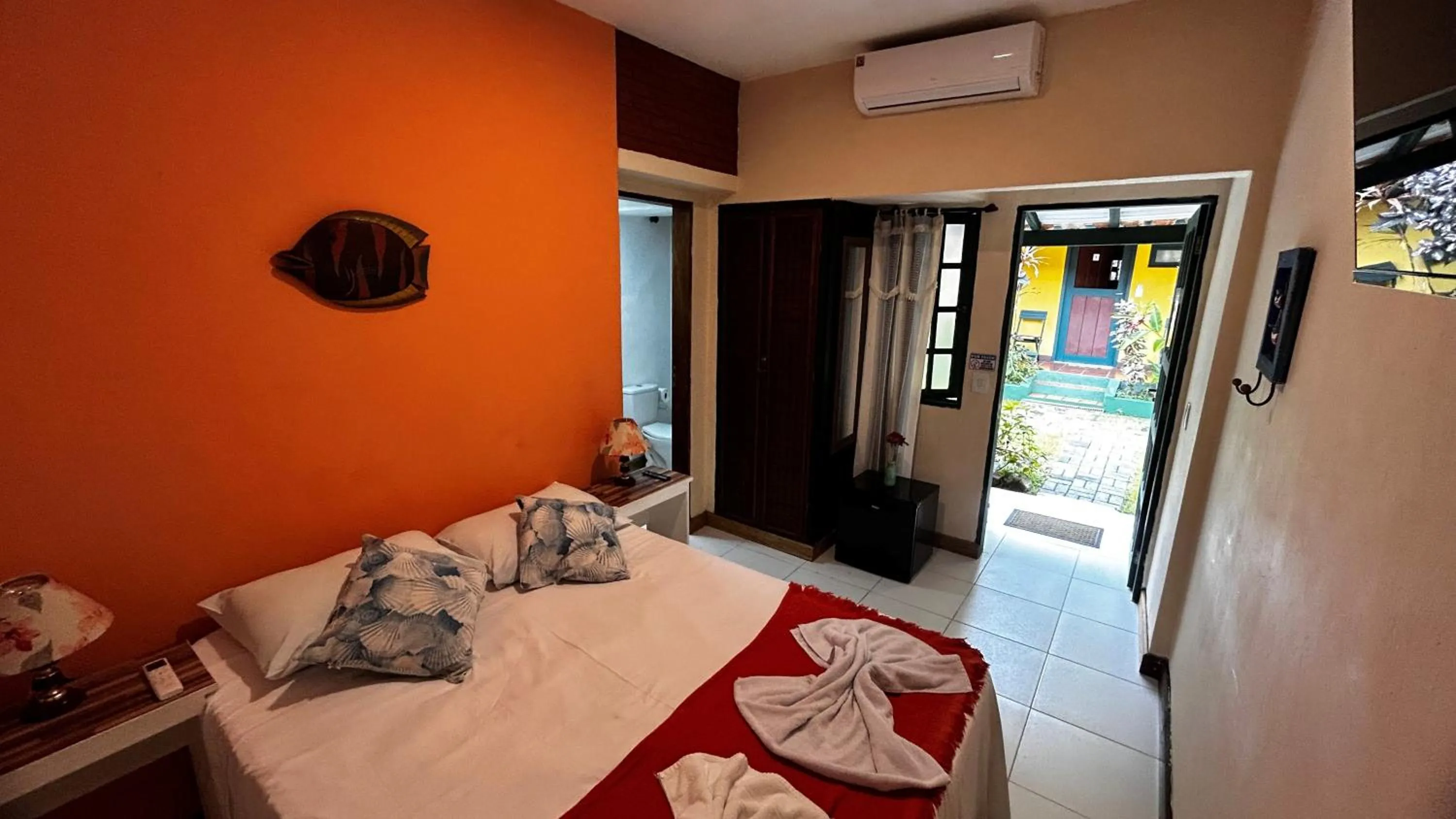 Bed in Pousada Aporan Ilhabela