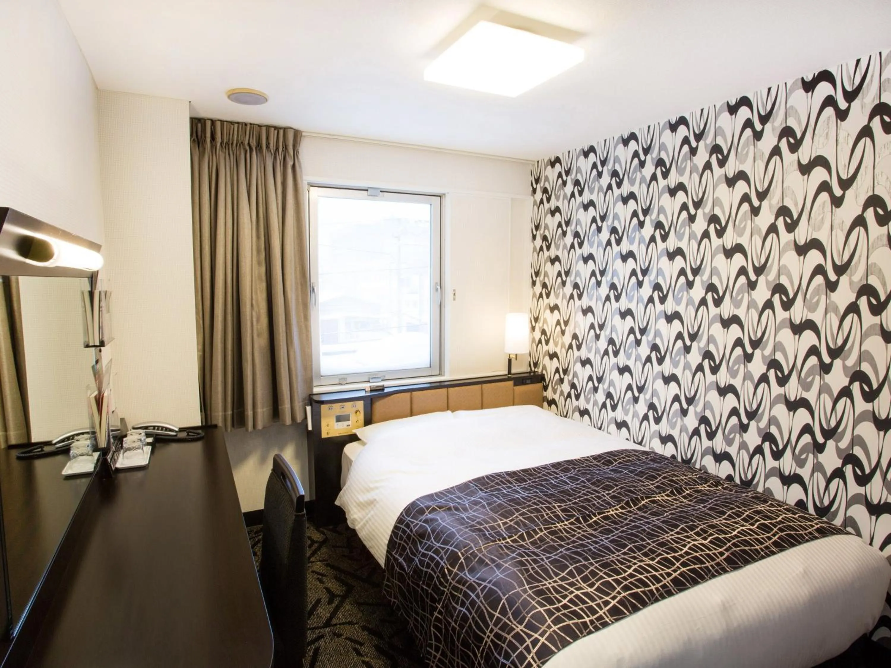 Photo of the whole room, Bed in APA Hotel Hakodate Ekimae