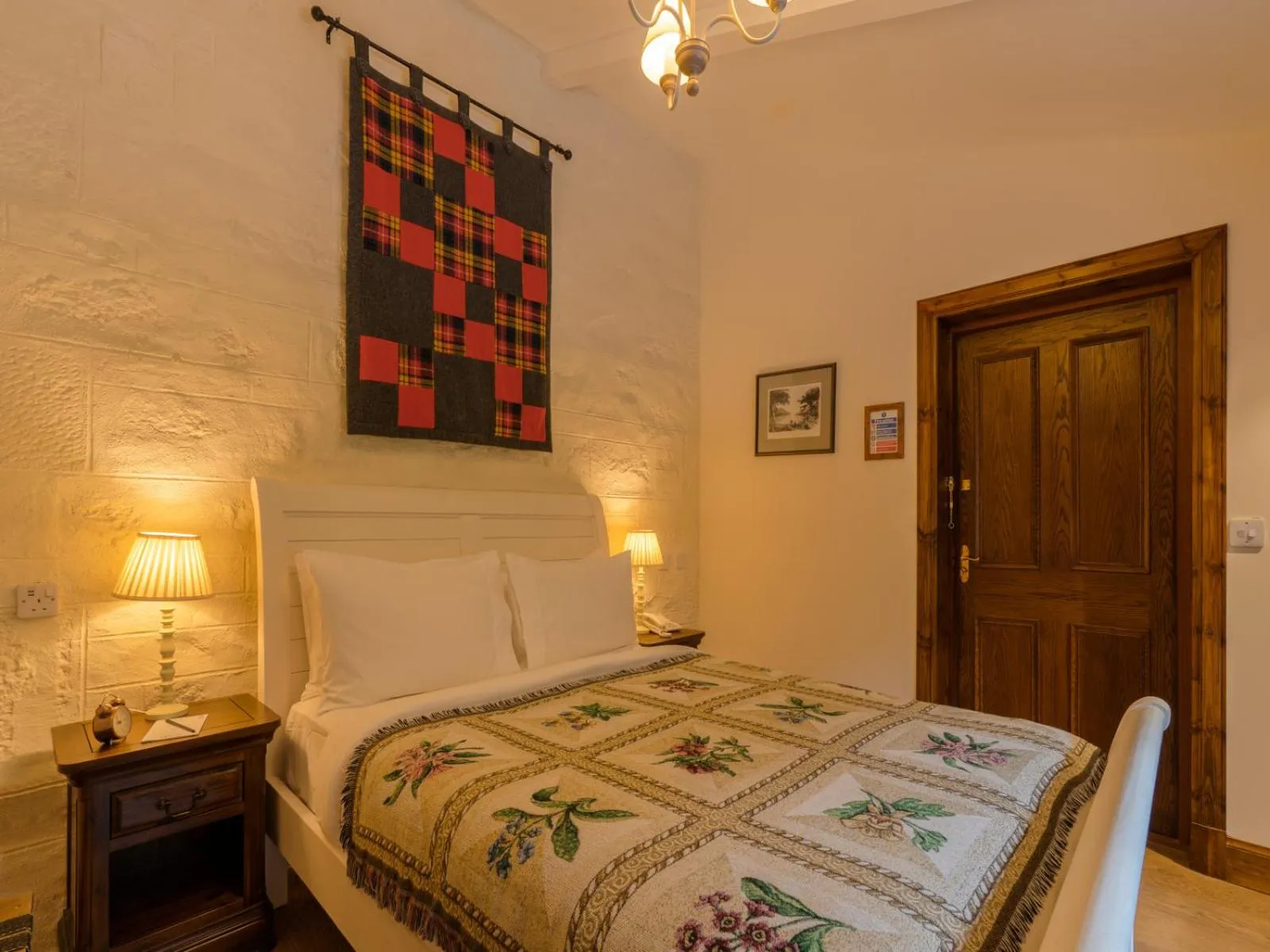 Bed in The Whispering Pine Lodge