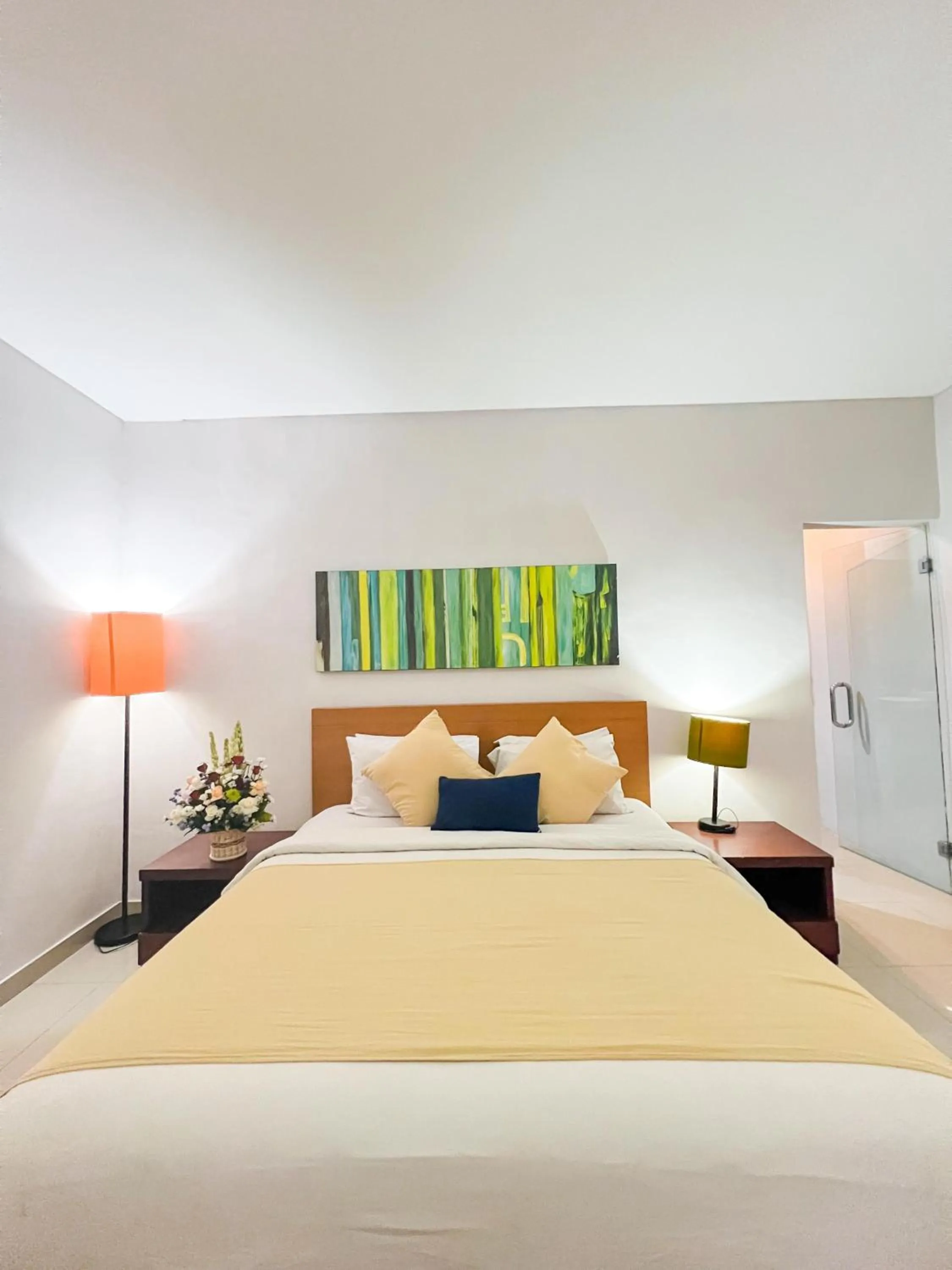 Bed in Apple Villas & Apartments