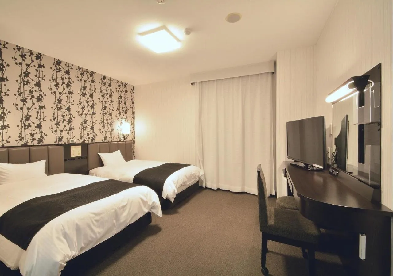 Photo of the whole room, Bed in APA Hotel Kagoshima Kokubu