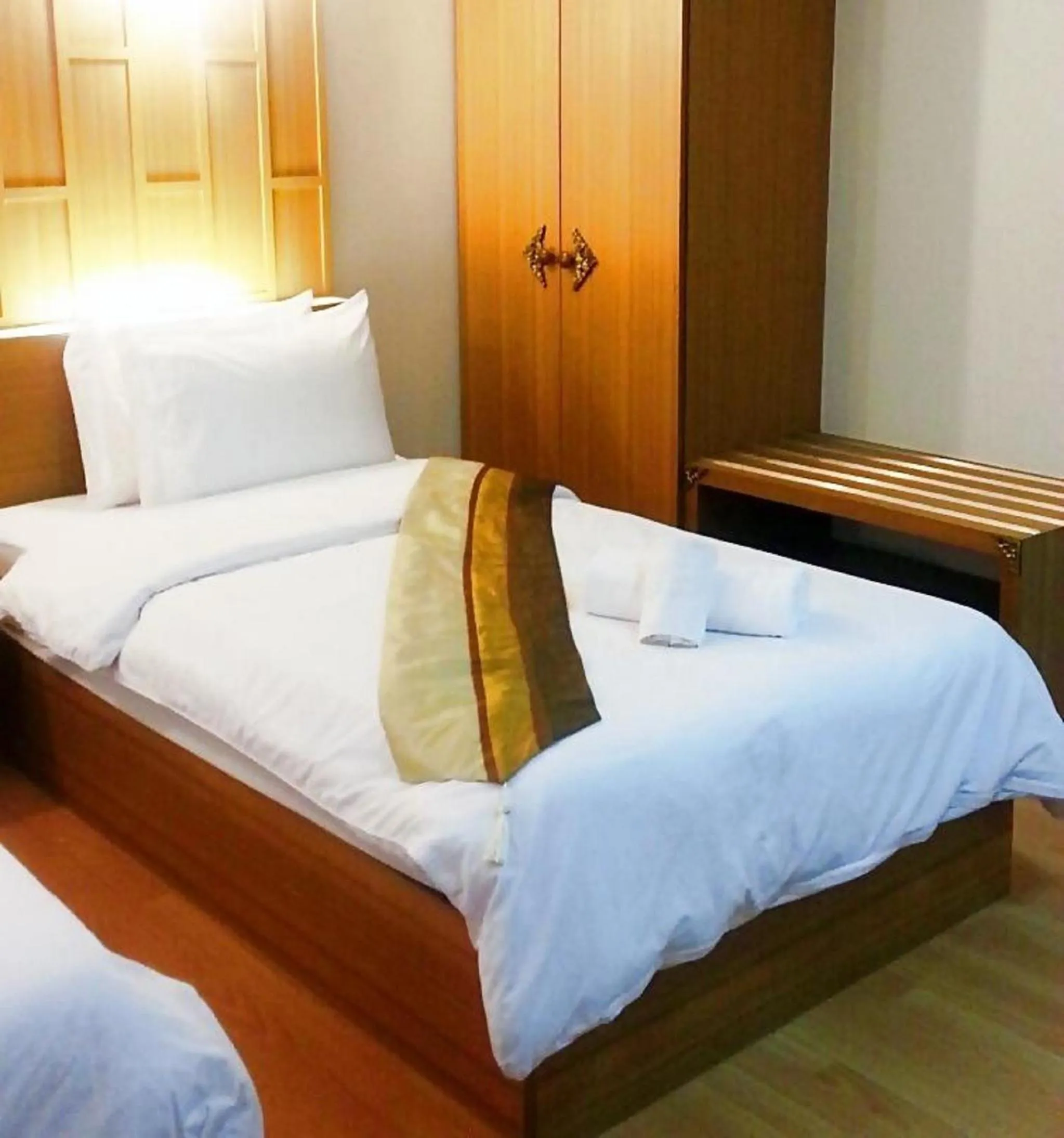 Bed in King Royal Garden Inn