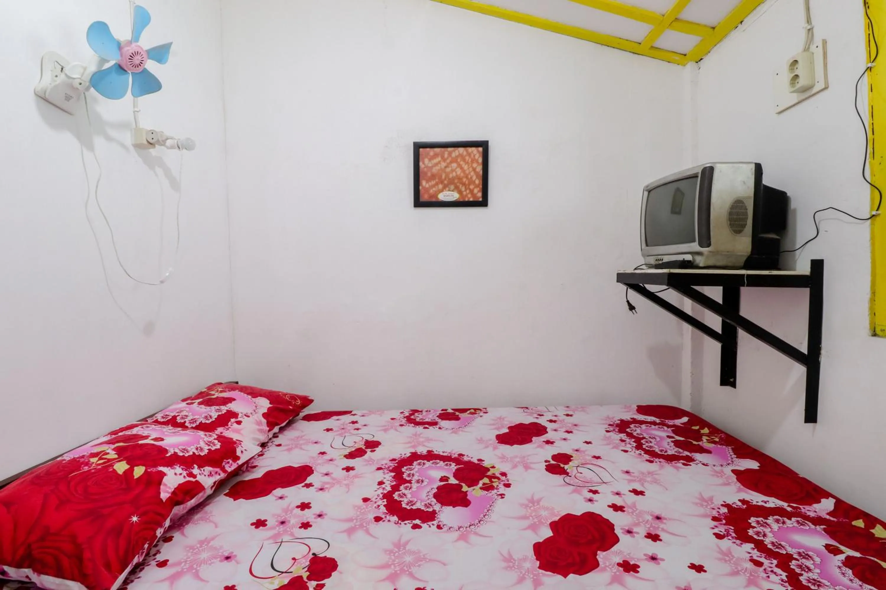 Bed in Homestay Ndalem Soewondo