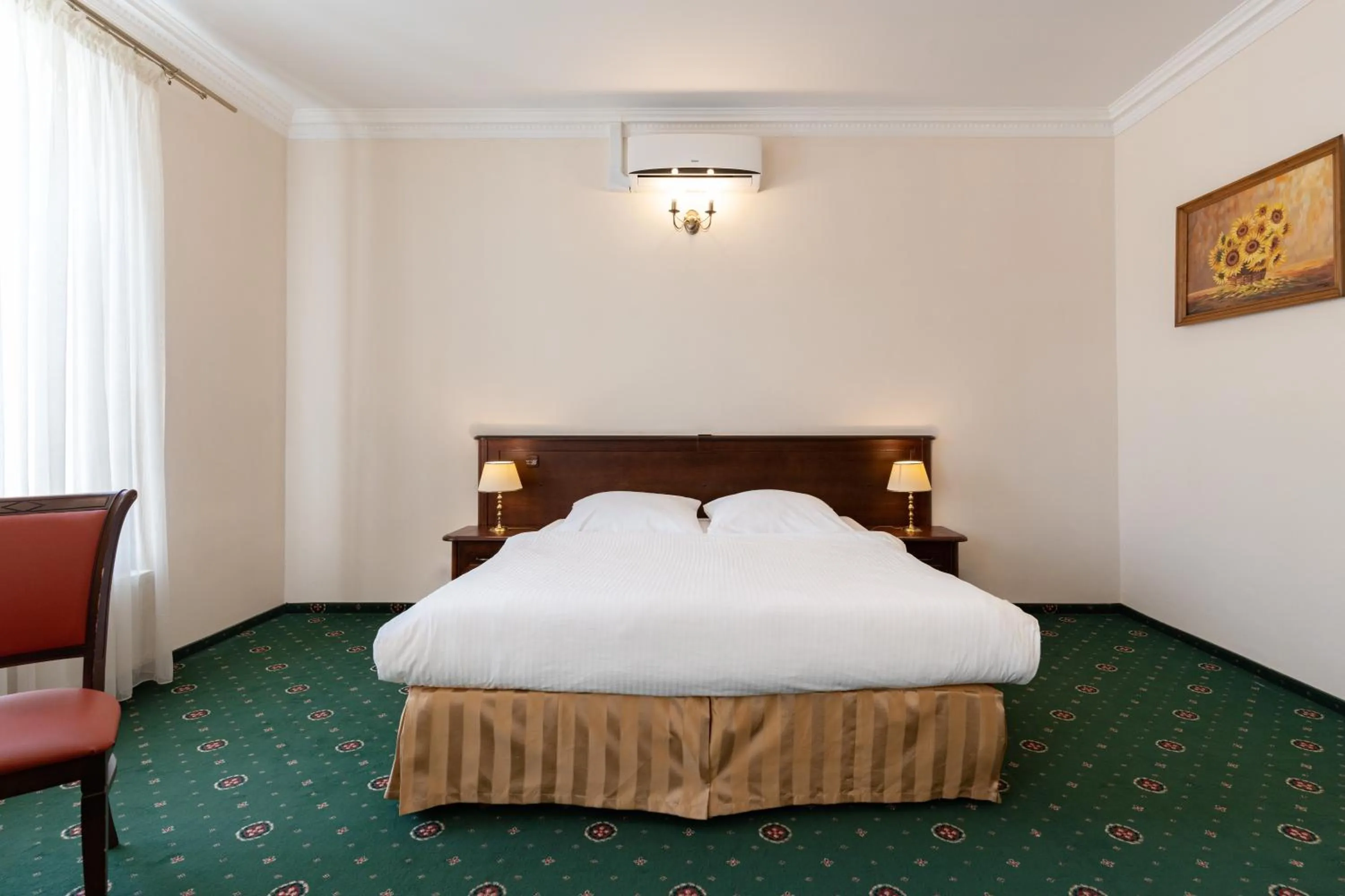 Bed in Royal Hotel Modlin