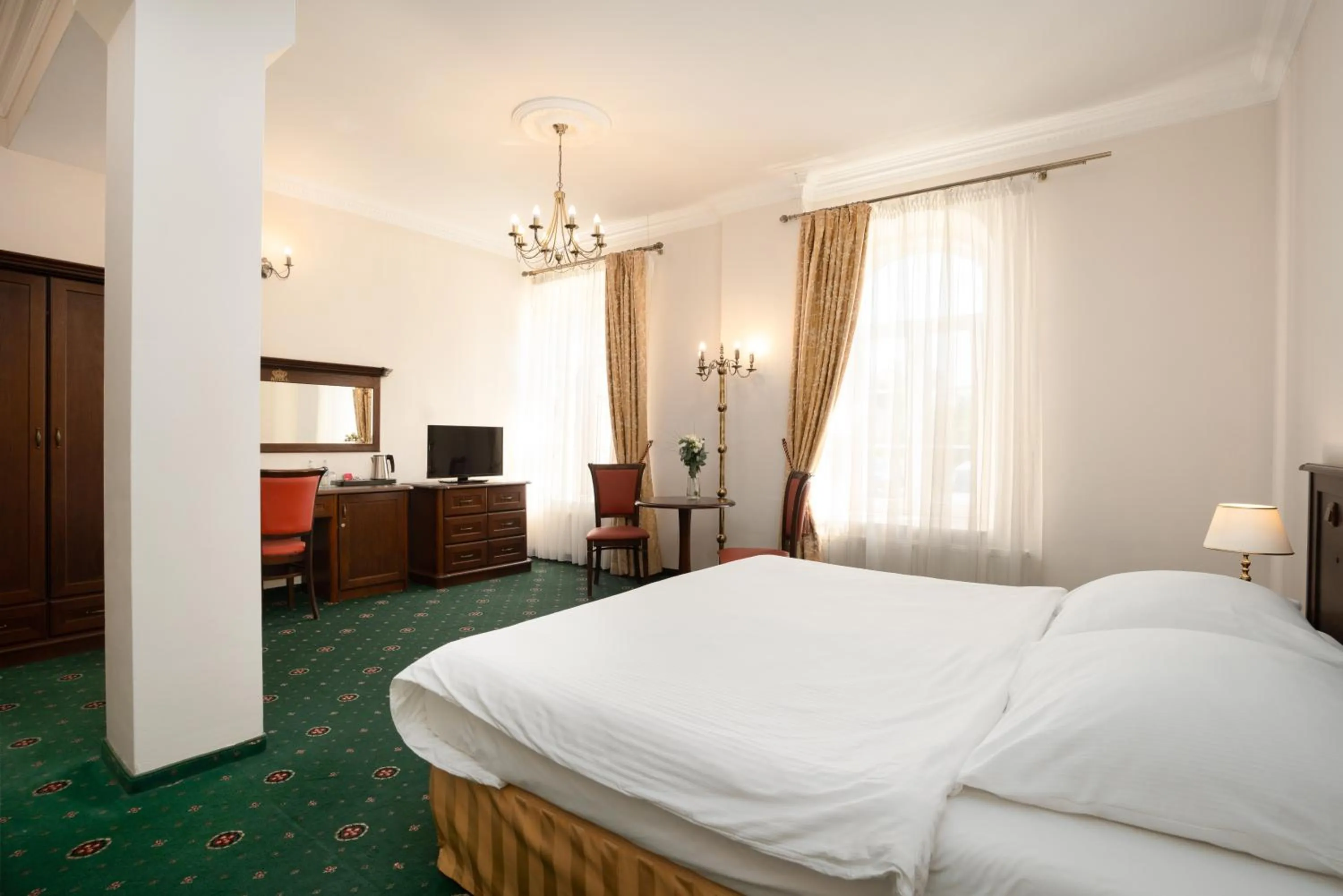 Bed in Royal Hotel Modlin