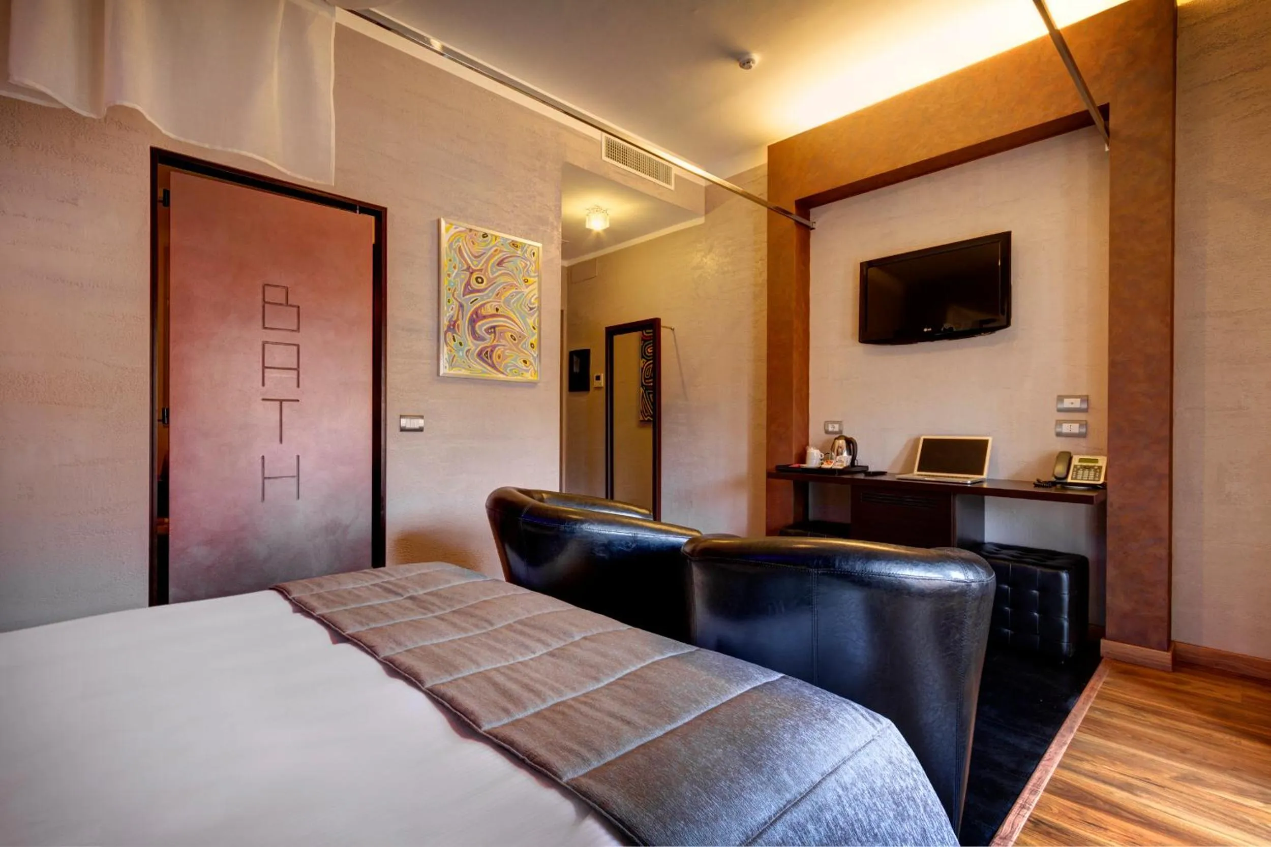 Photo of the whole room, Bed in Dharma Luxury Hotel