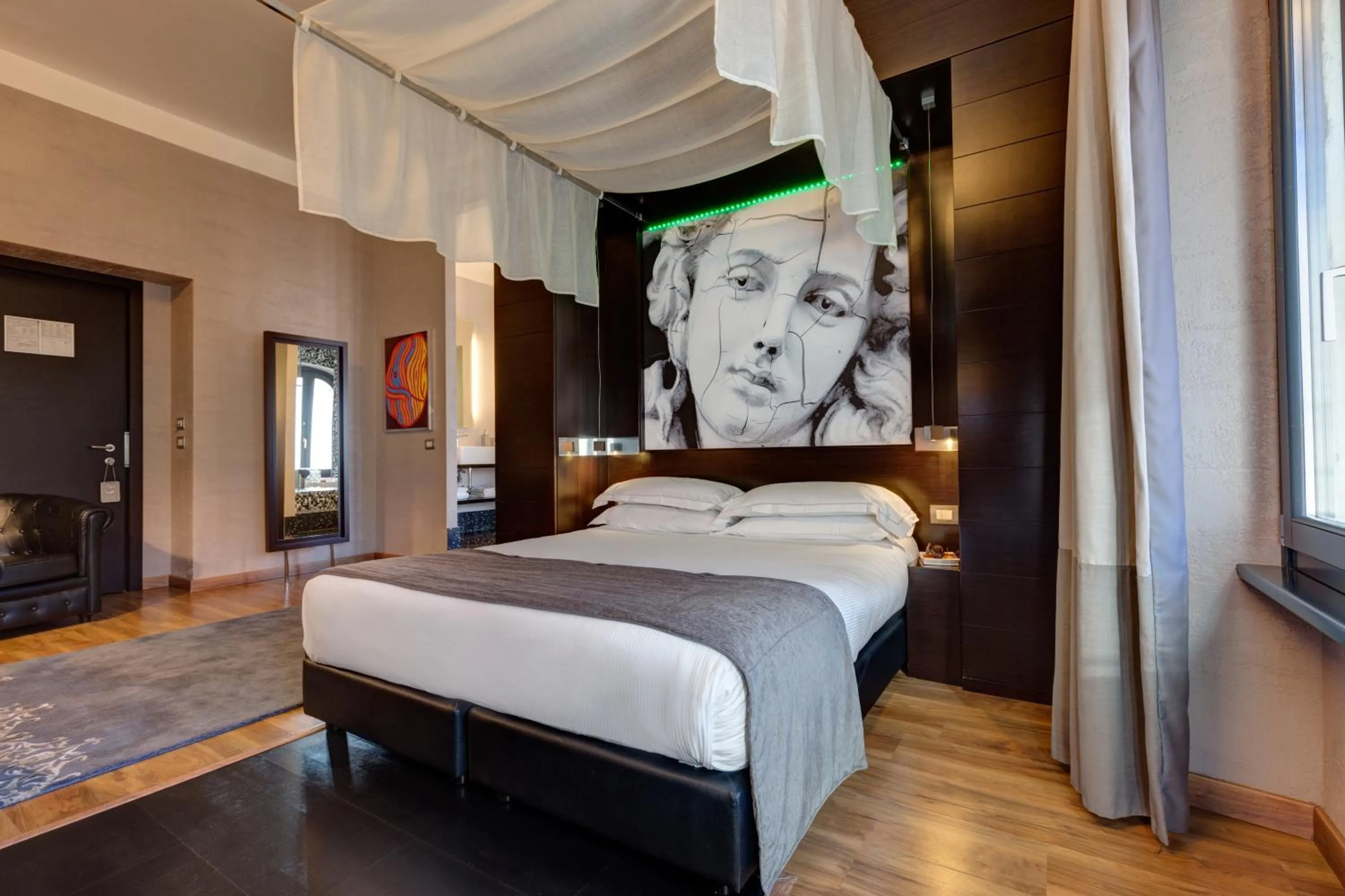 Photo of the whole room, Bed in Dharma Luxury Hotel