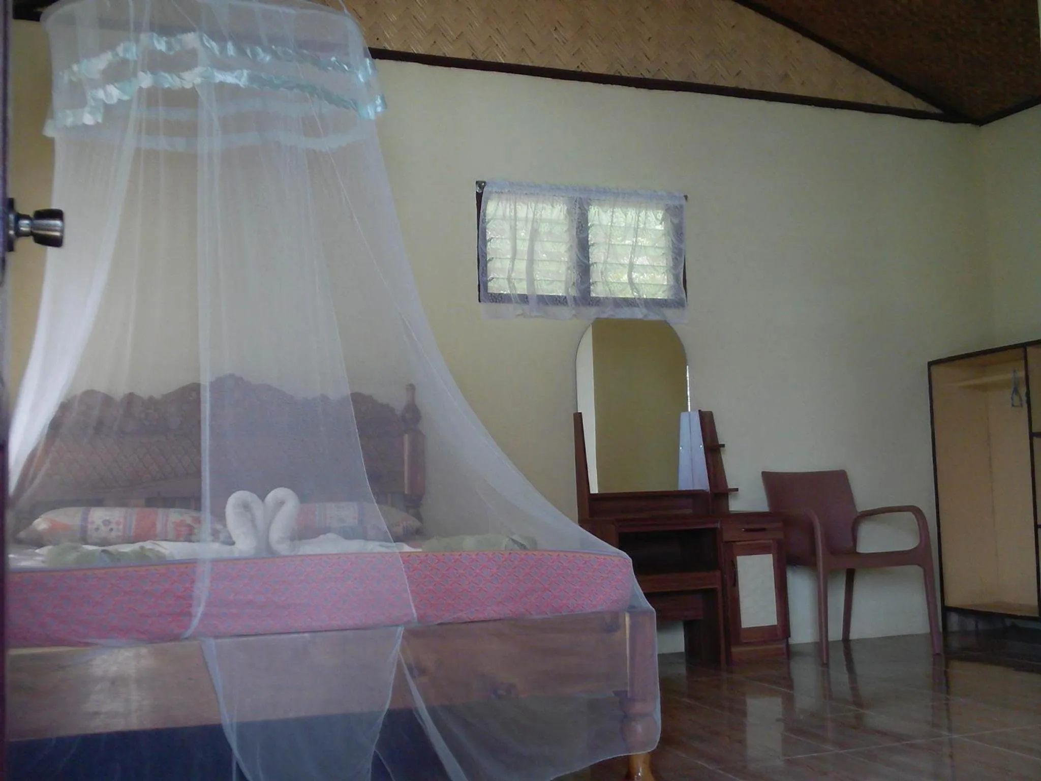 Bed in Coconut Garden Island Resort