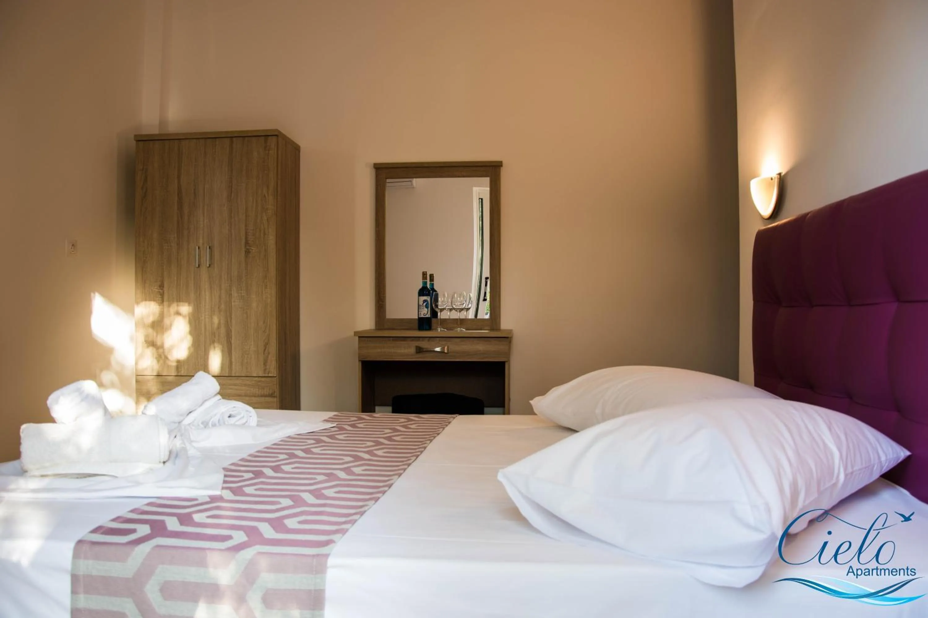 Bed in Cielo Apartments