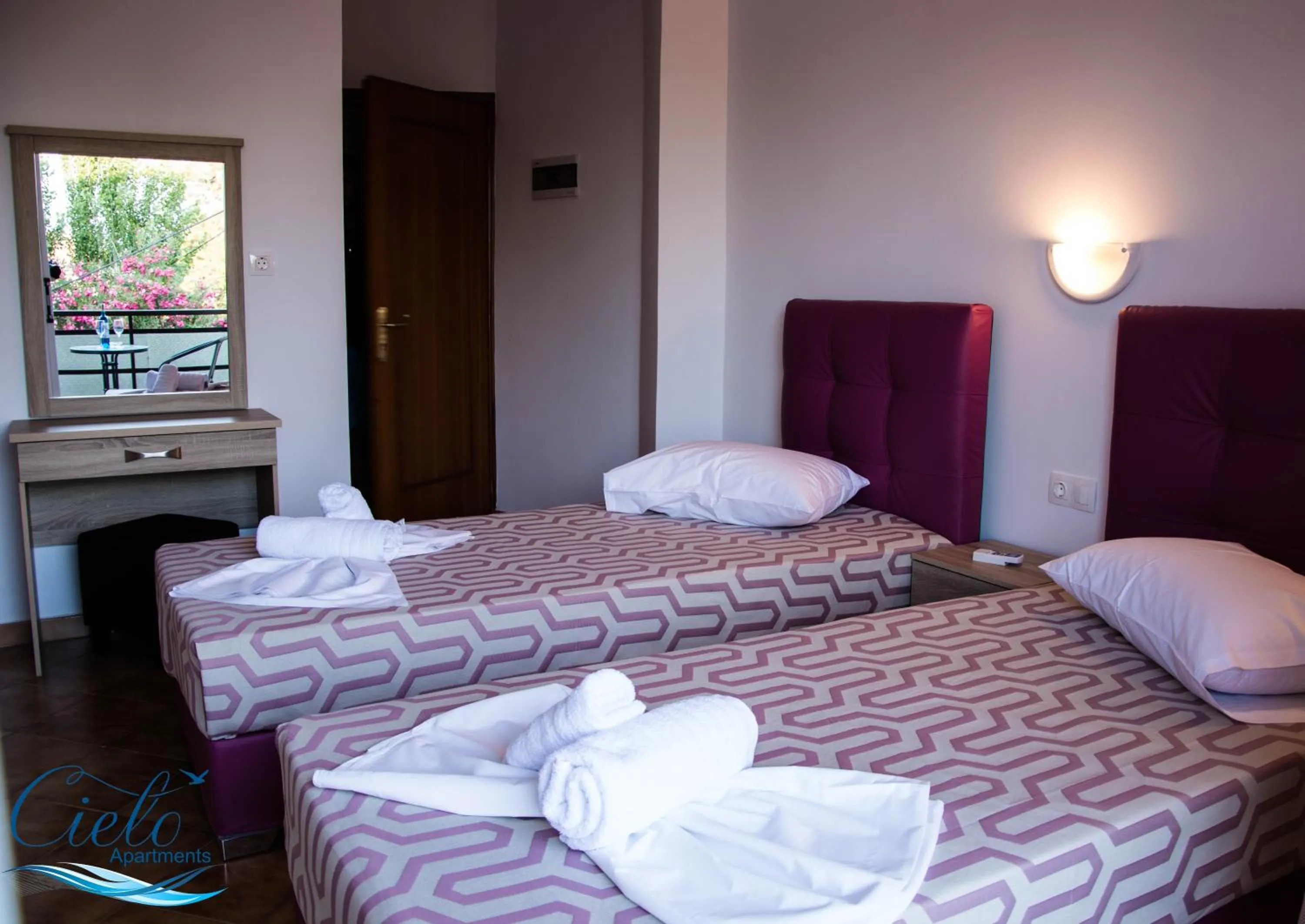 Bed in Cielo Apartments