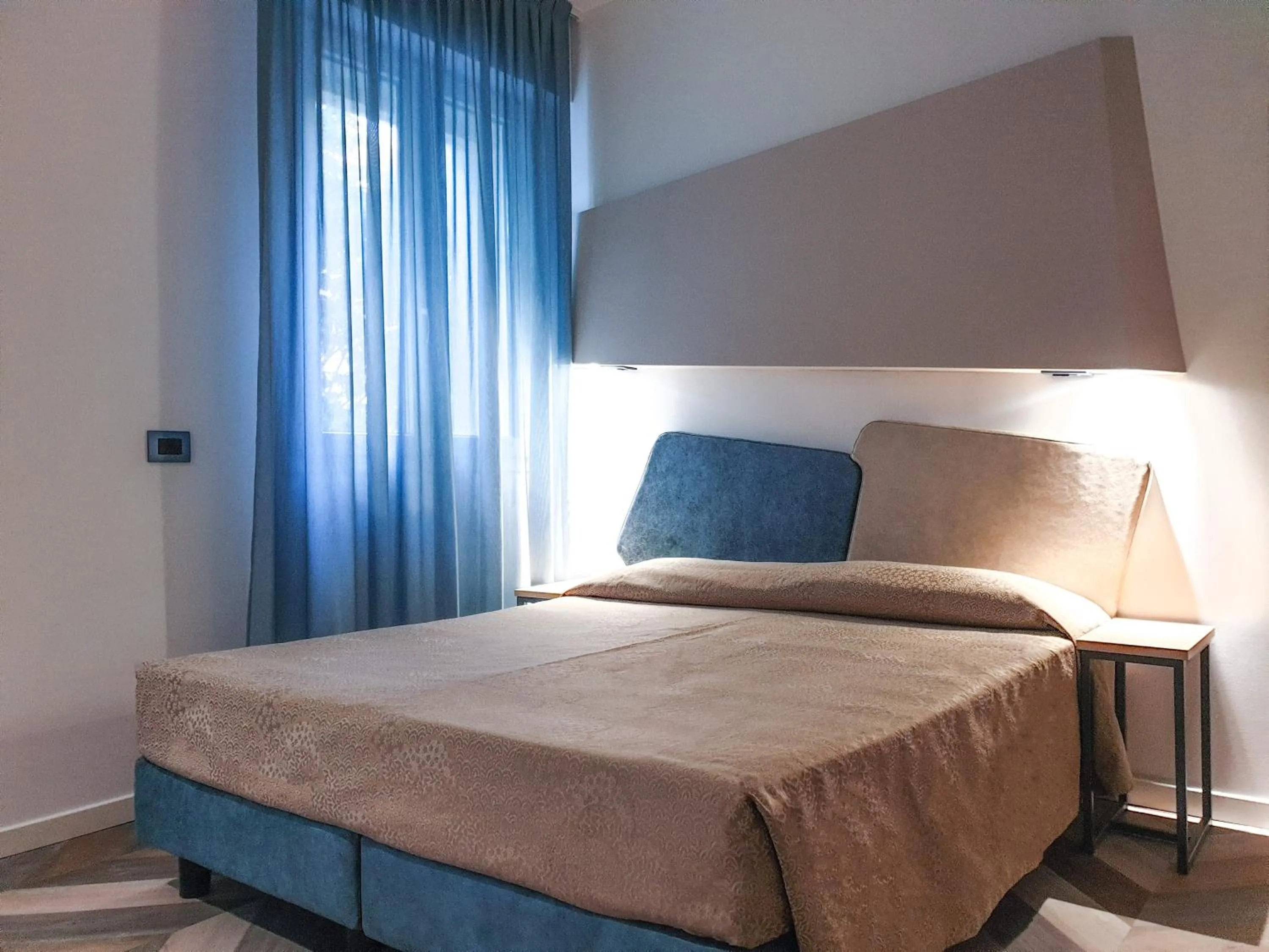 Decorative detail, Bed in Color Hotel Rimini