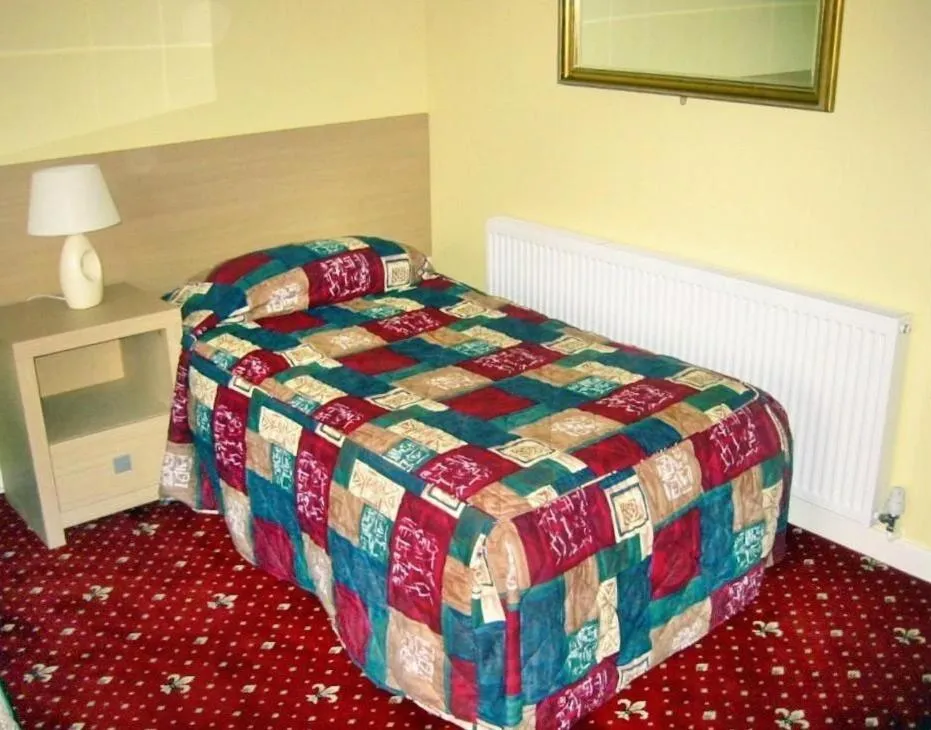 Bed in The Langham Hotel