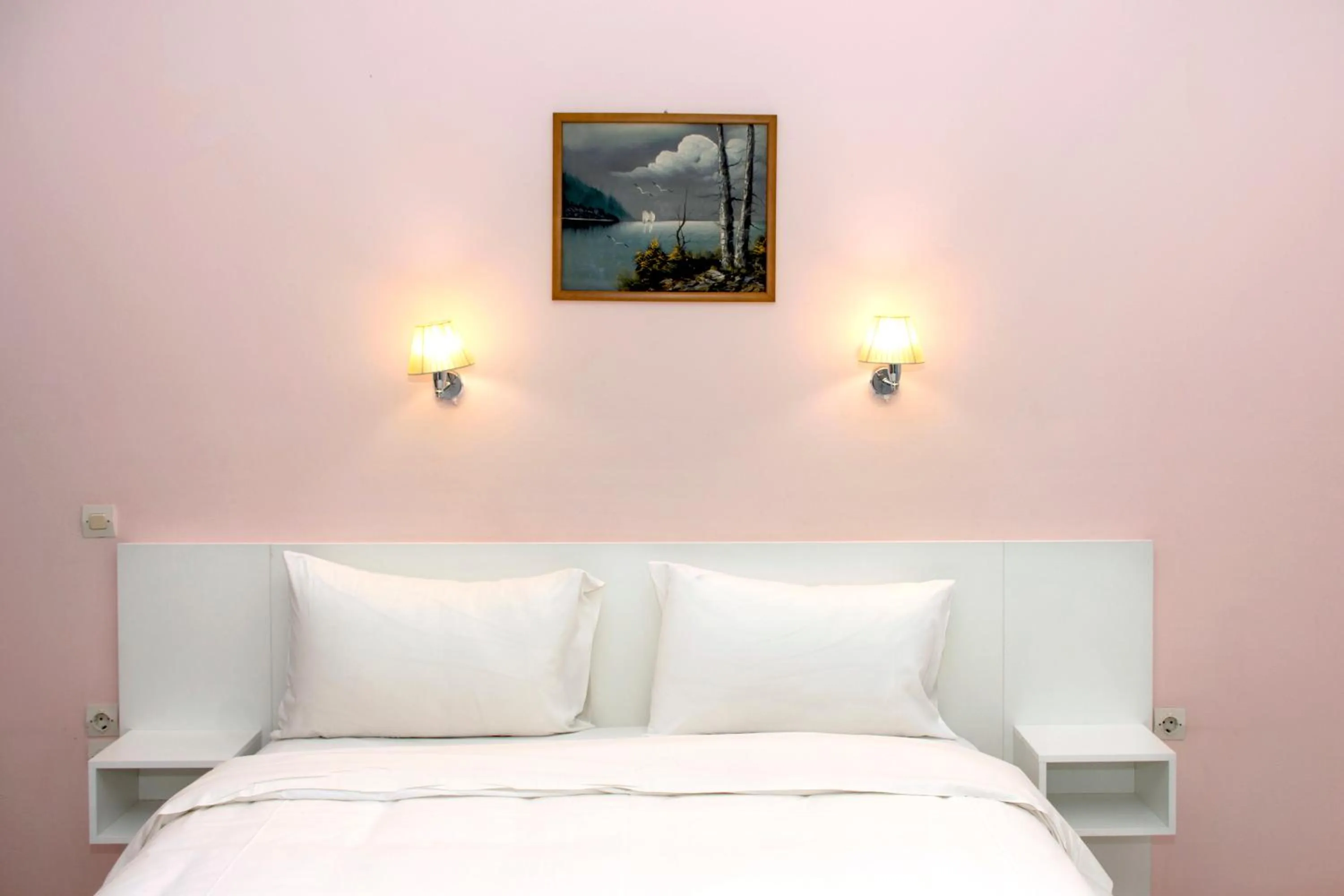 Bed in Revekka Rooms