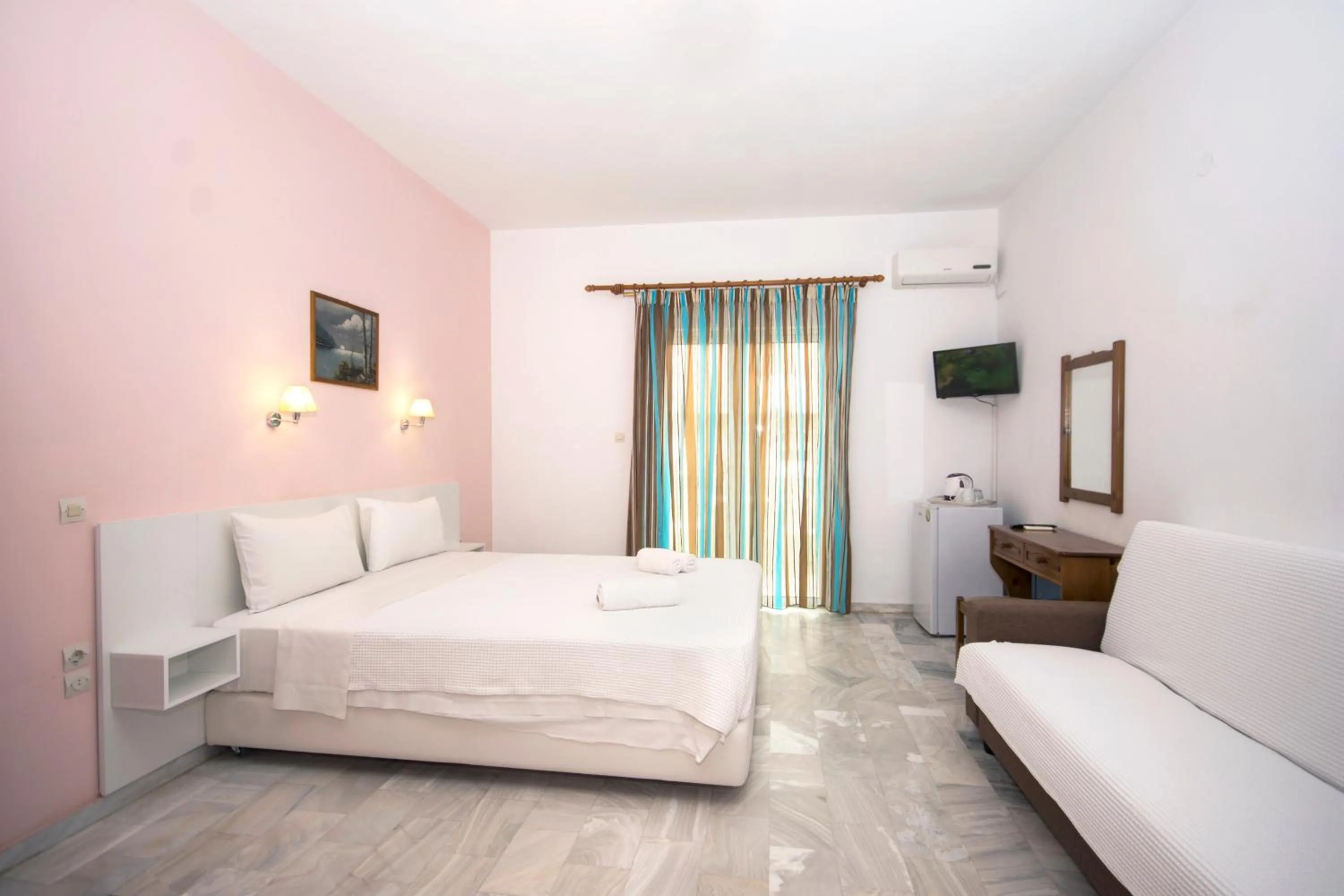 Bed in Revekka Rooms