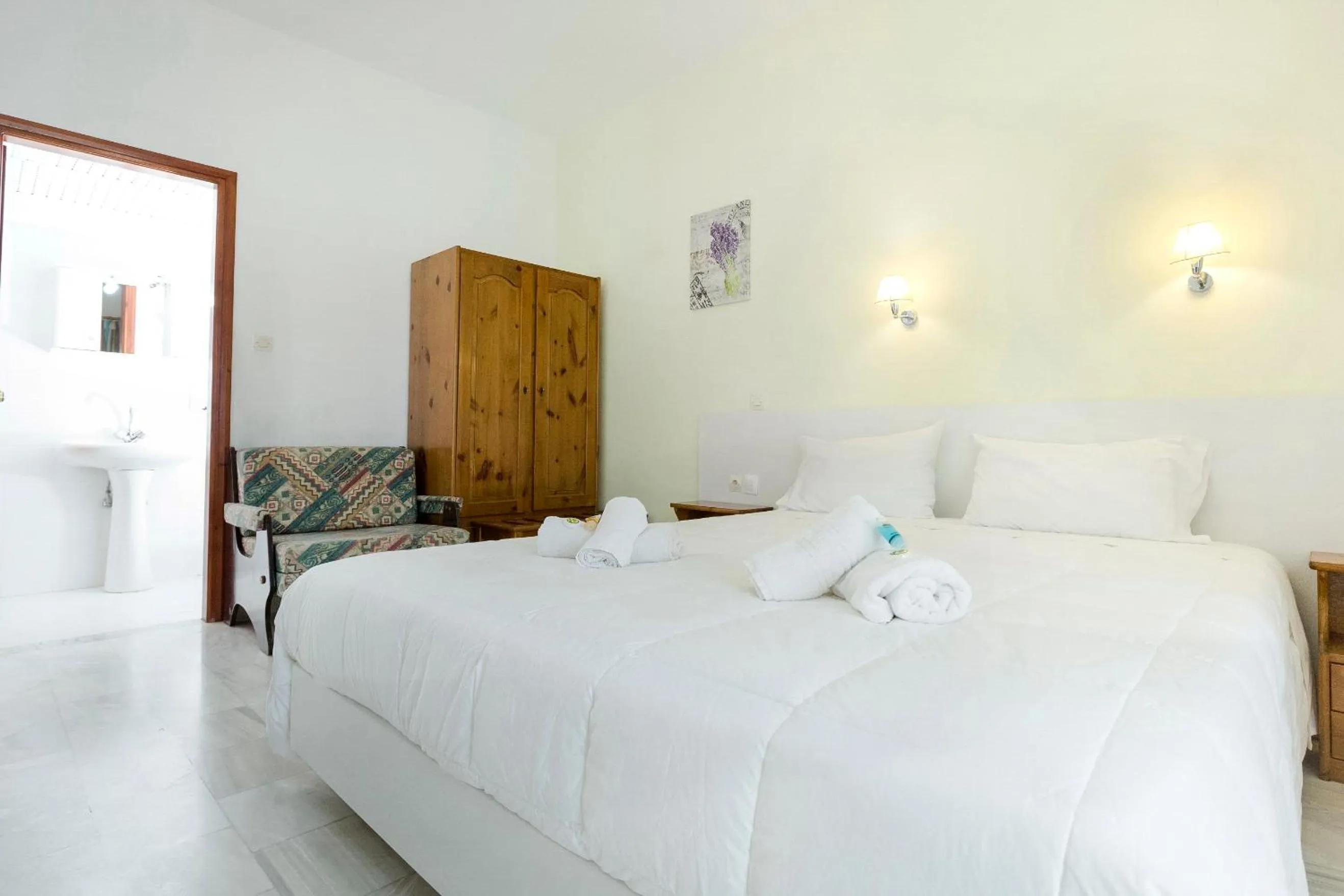 Bedroom in Revekka Rooms