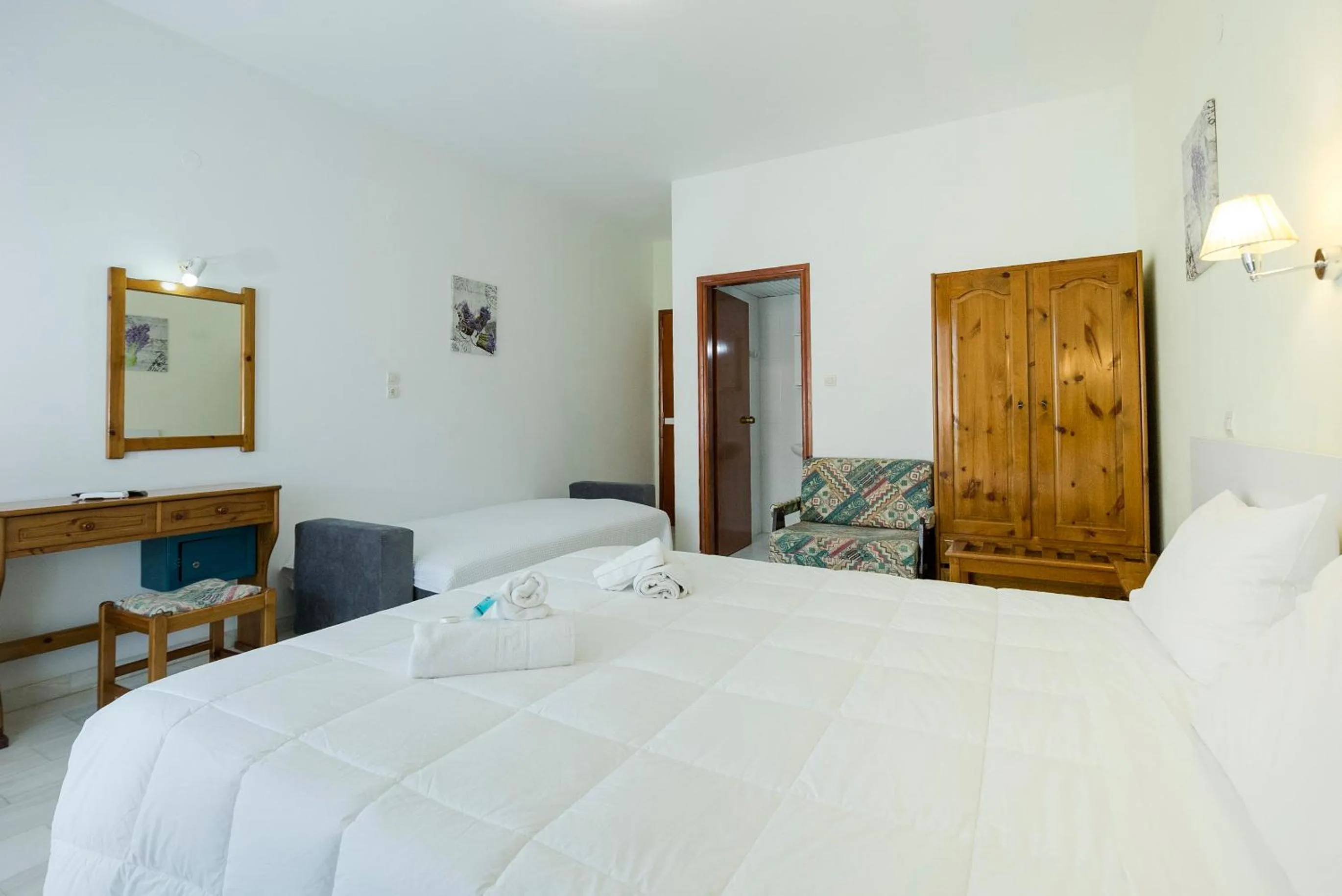 Bedroom in Revekka Rooms