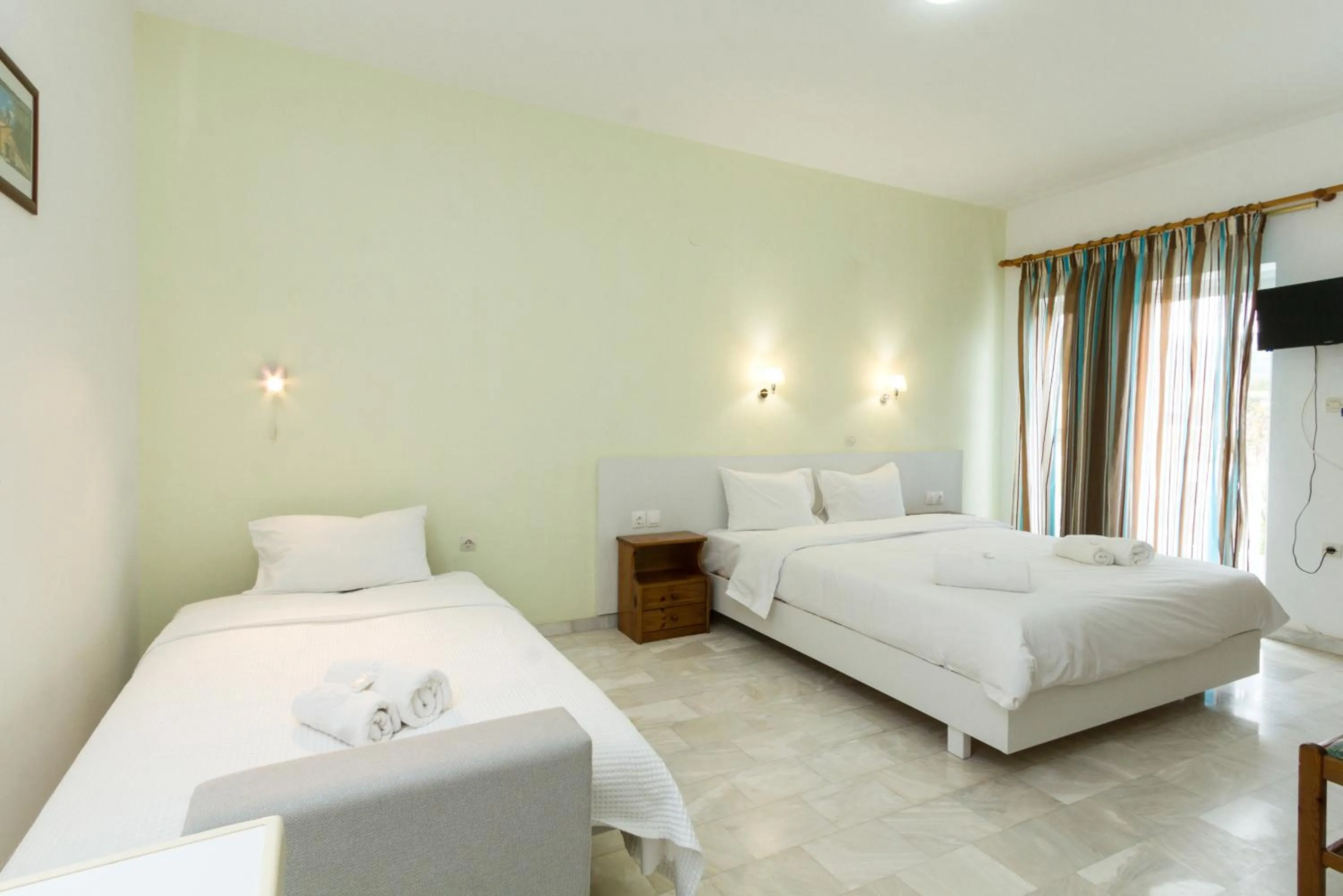 Bedroom in Revekka Rooms