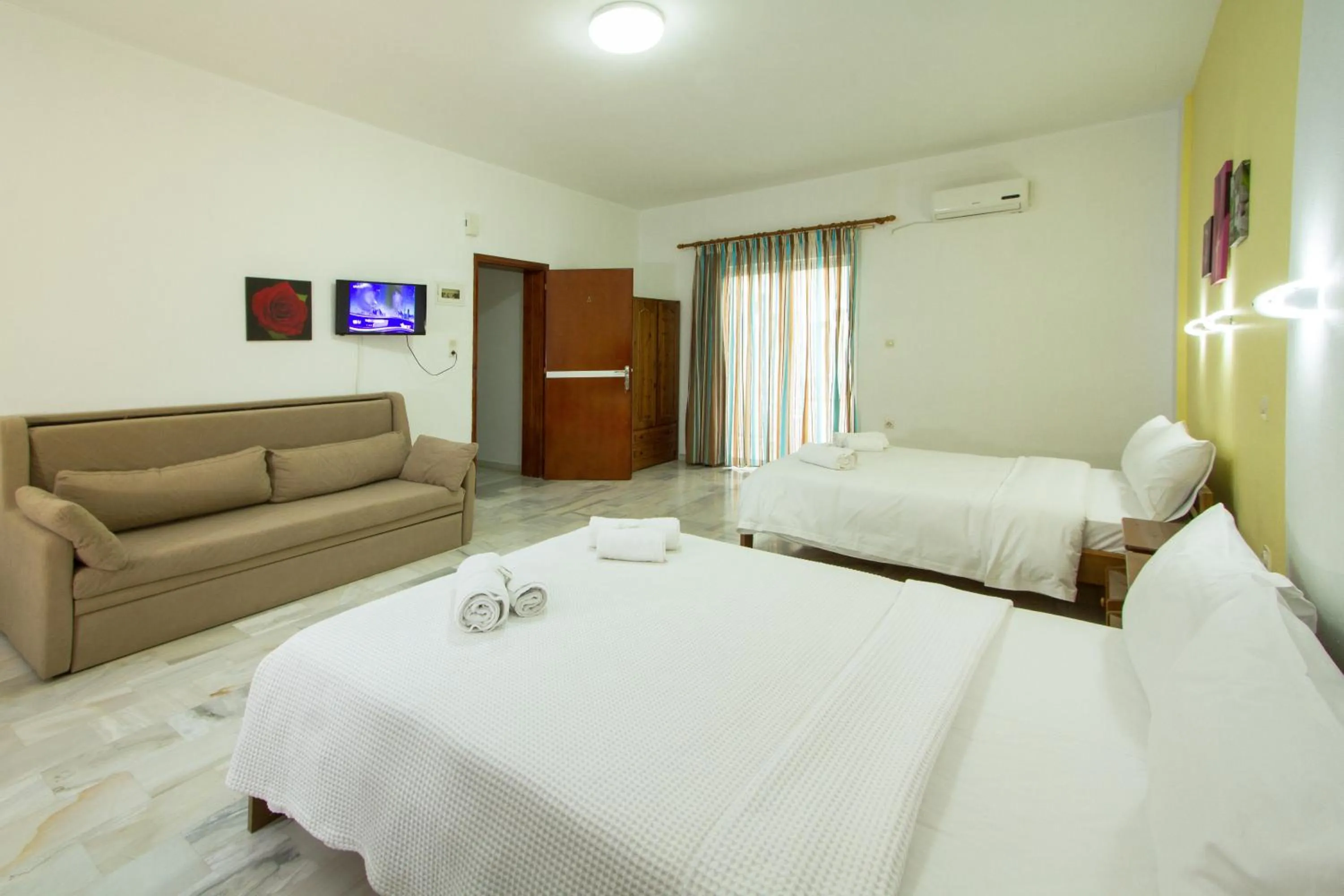 Bedroom in Revekka Rooms